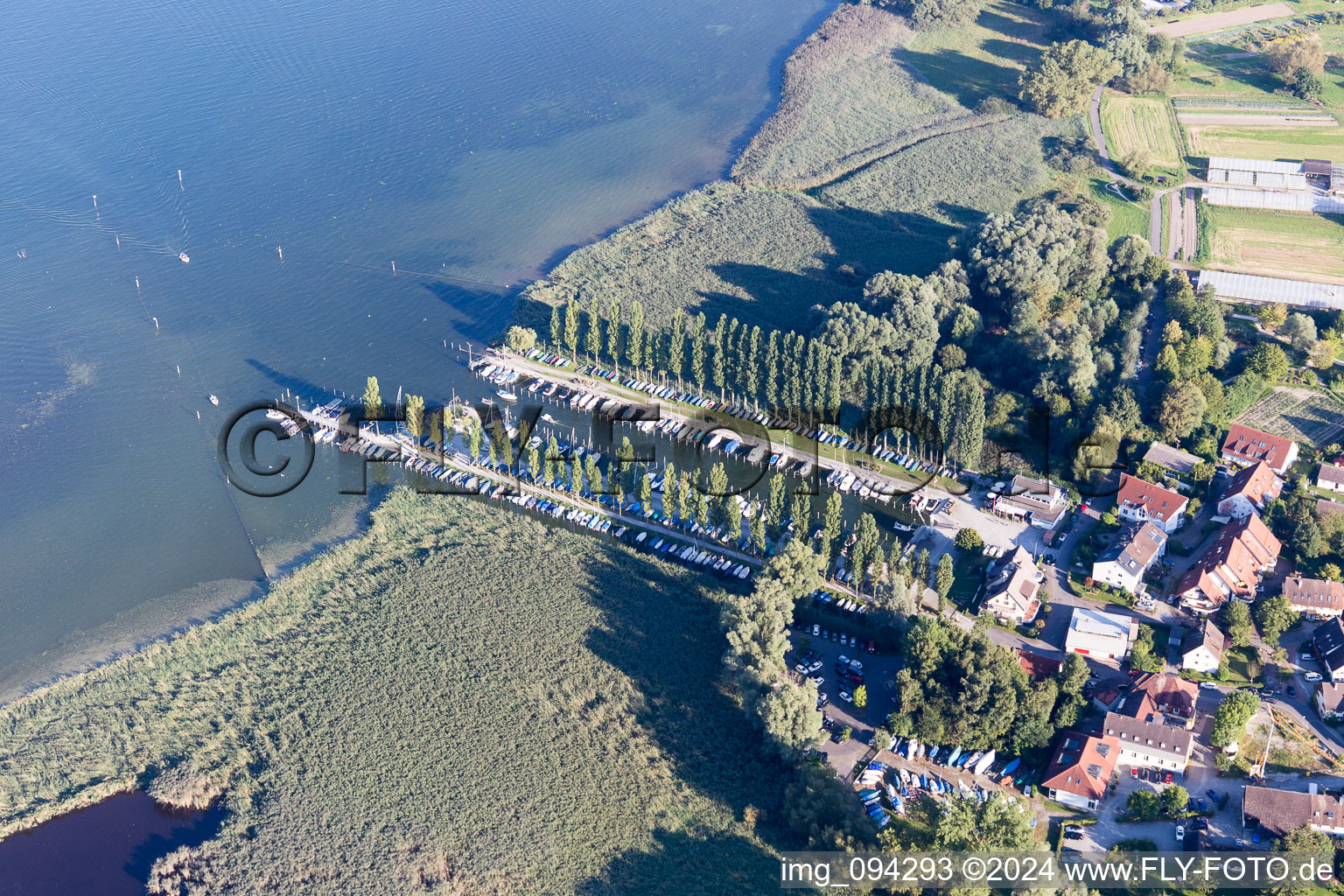 Pleasure boat marina with docks and moorings on the shore area of Lake of Constance in Moos in the state Baden-Wurttemberg, Germany