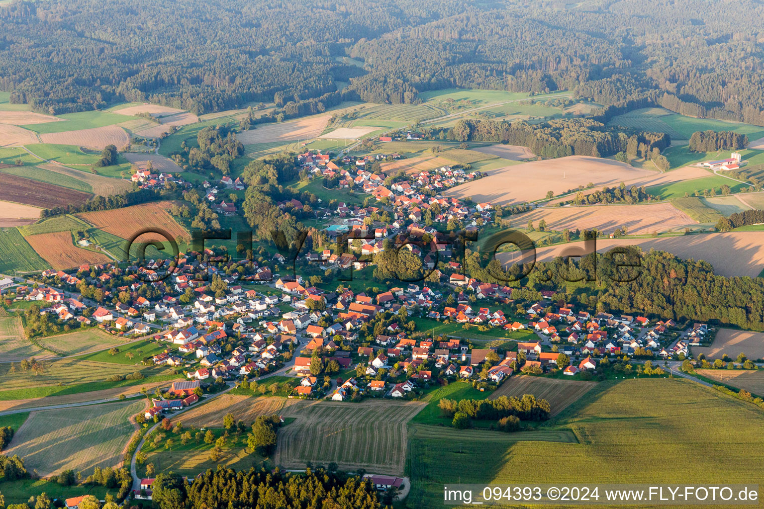 Village - view on the edge of agricultural fields and farmland in Herdwangen-Schoenach in the state Baden-Wurttemberg, Germany