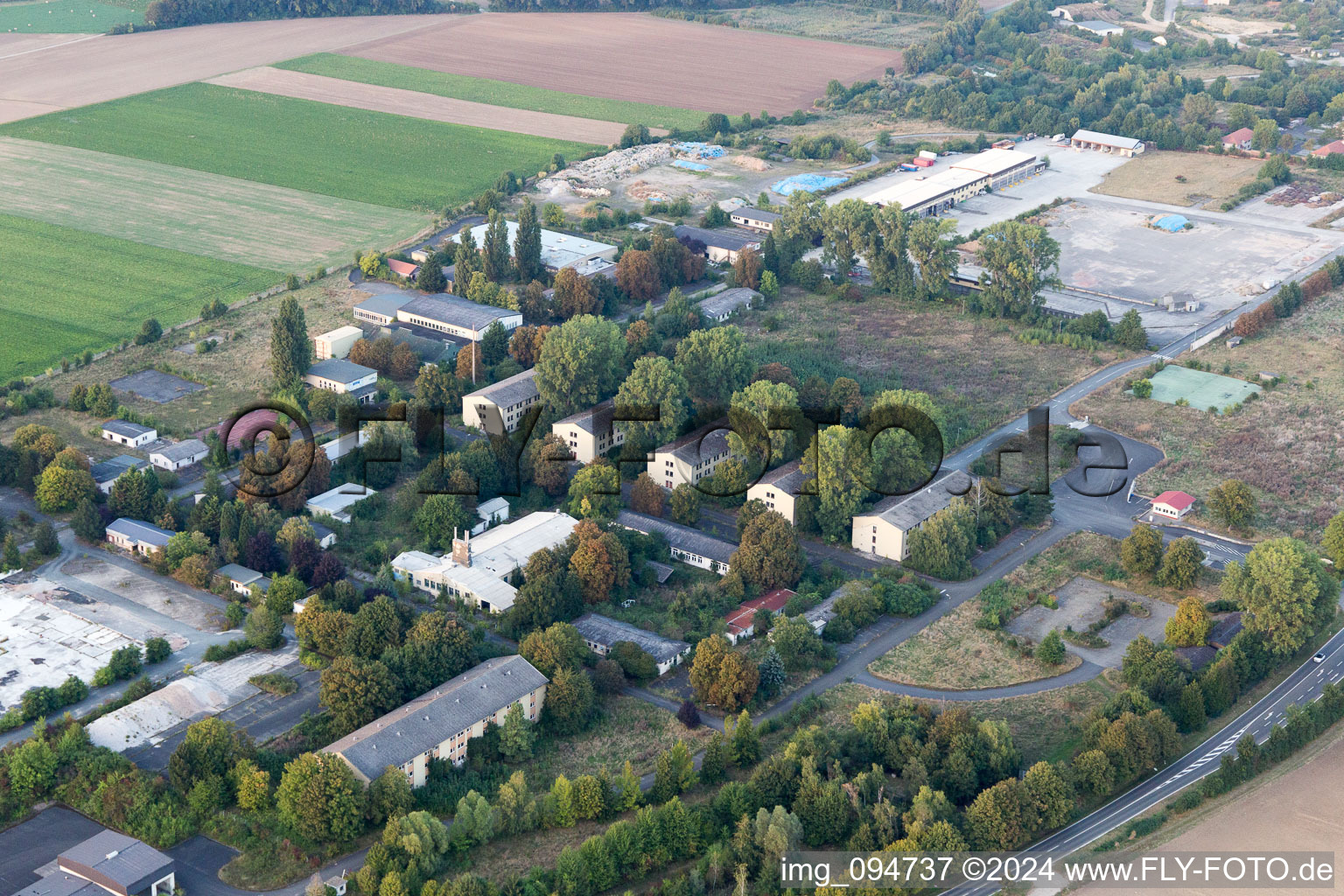 Aerial view of Conversion surfaces on the renatured site of the former barracks and military - real estate in Dexheim in the state Rhineland-Palatinate, Germany