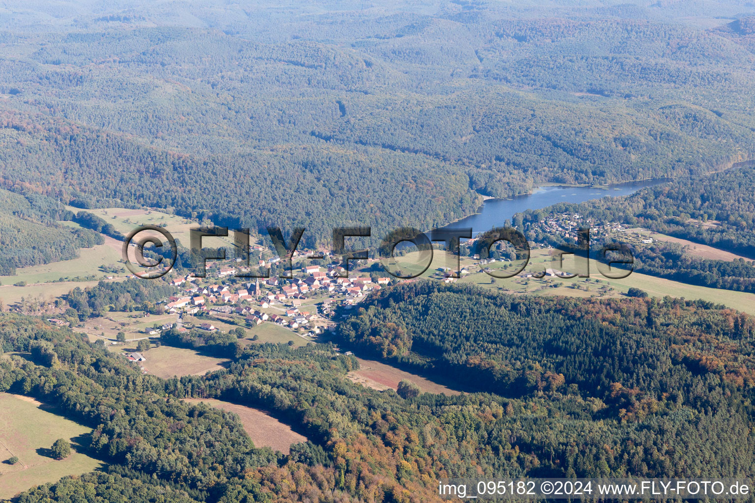 Village on the lake bank areas of Etang de Haspelschiedt in Haspelschiedt in Grand Est, France