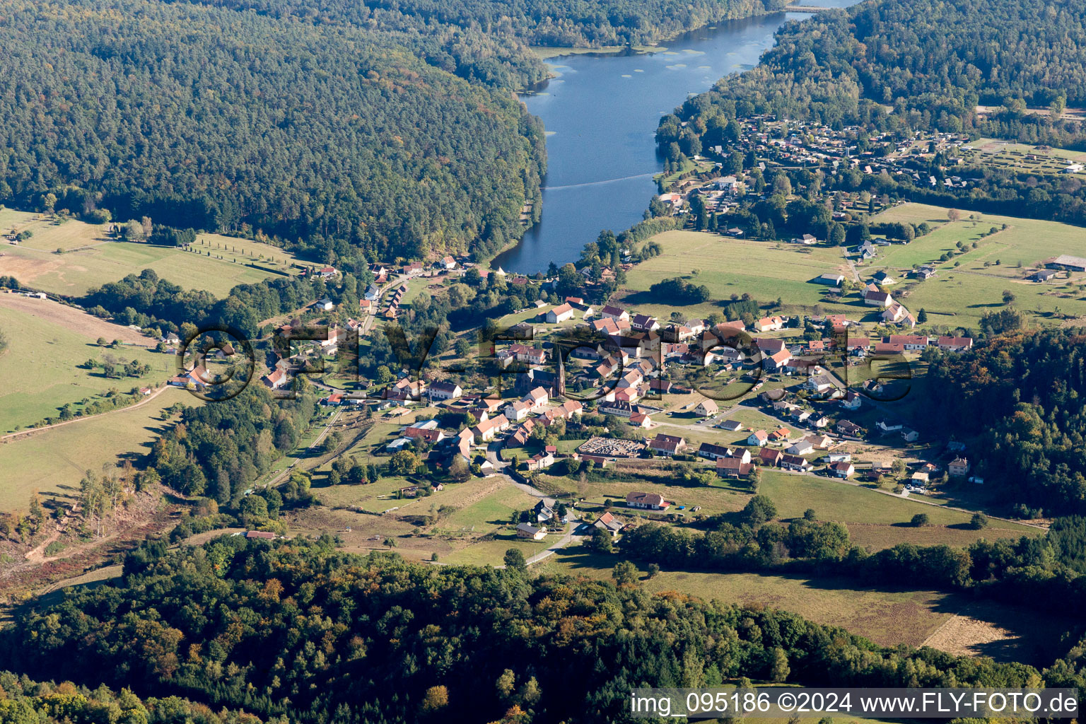 Oblique view of Village on the lake bank areas of Etang de Haspelschiedt in Haspelschiedt in Grand Est, France