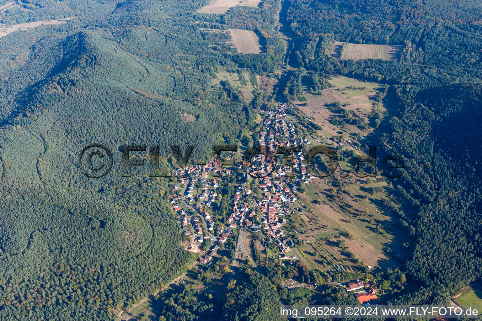 Aerial view of Village - view on the edge of agricultural fields and farmland in Birkenhoerdt in the state Rhineland-Palatinate, Germany