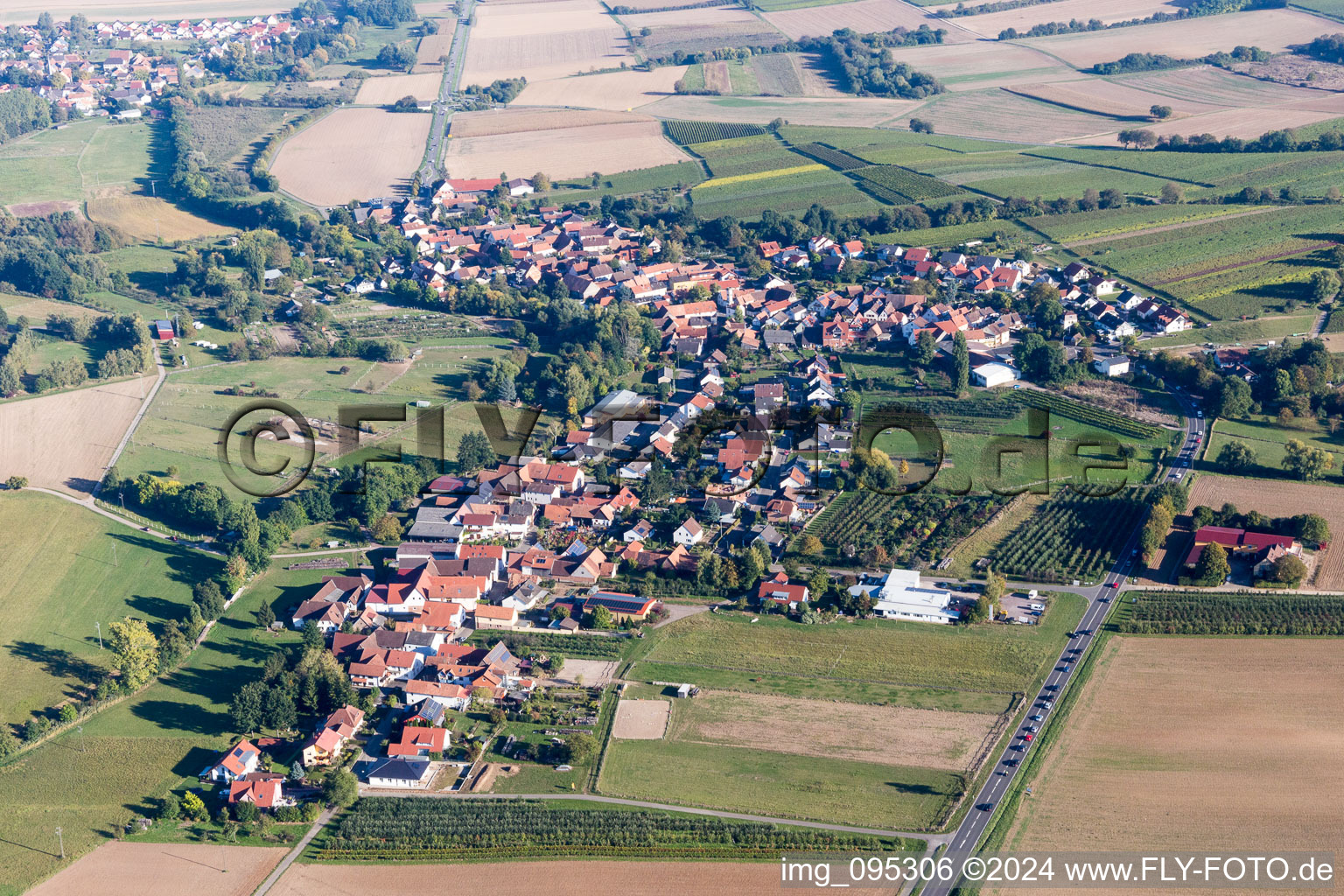 Village - view on the edge of agricultural fields and farmland in Oberhausen in the state Rhineland-Palatinate, Germany
