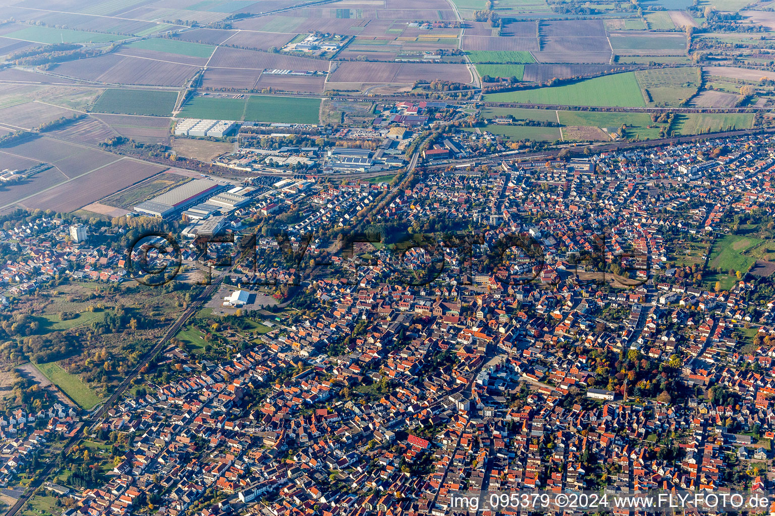 Oblique view of City area with outside districts and inner city area in Schifferstadt in the state Rhineland-Palatinate, Germany