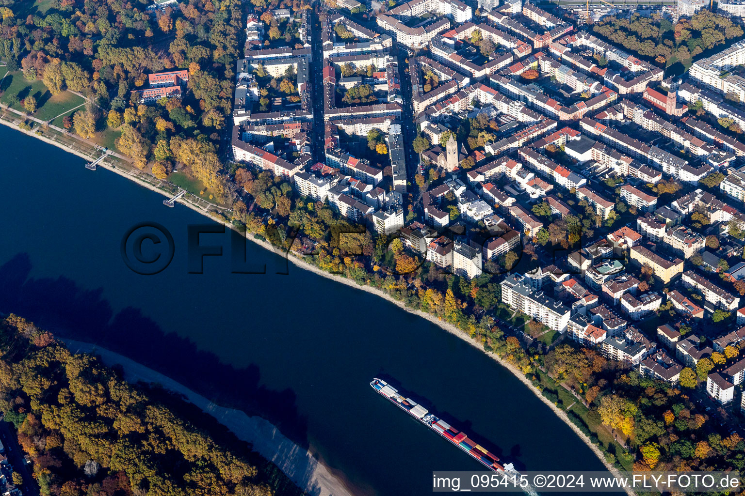 Aerial view of Town on the banks of the river of the Rhine river in the district Lindenhof in Mannheim in the state Baden-Wurttemberg, Germany