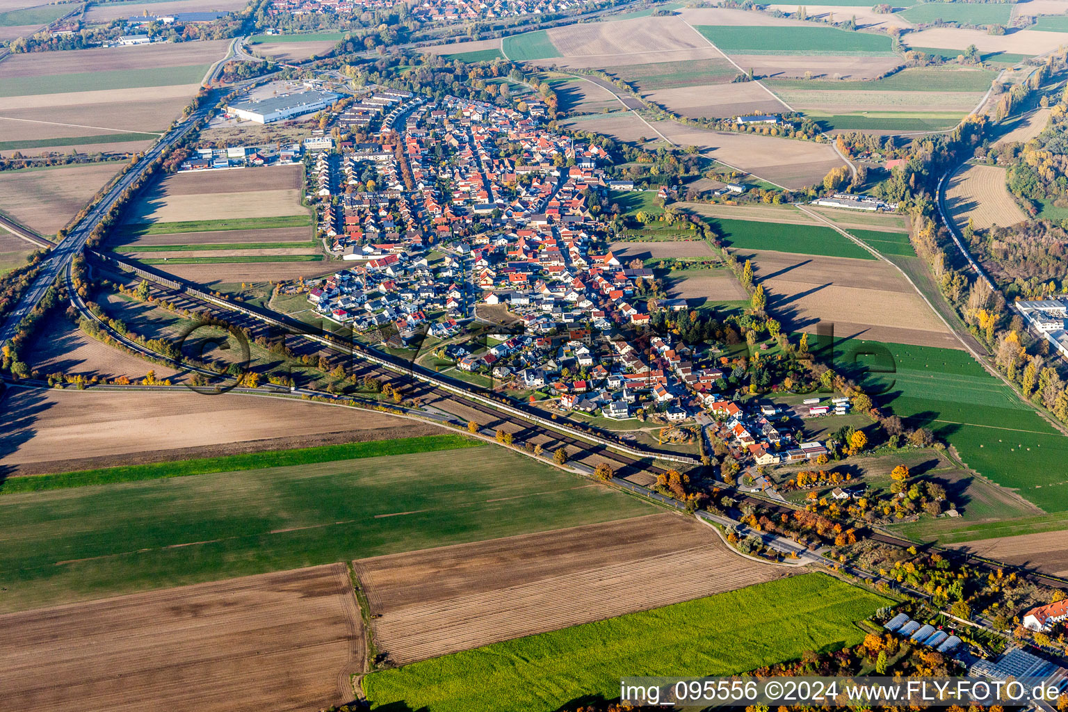 Village - view on the edge of agricultural fields and farmland in Studernheim in the state Rhineland-Palatinate, Germany