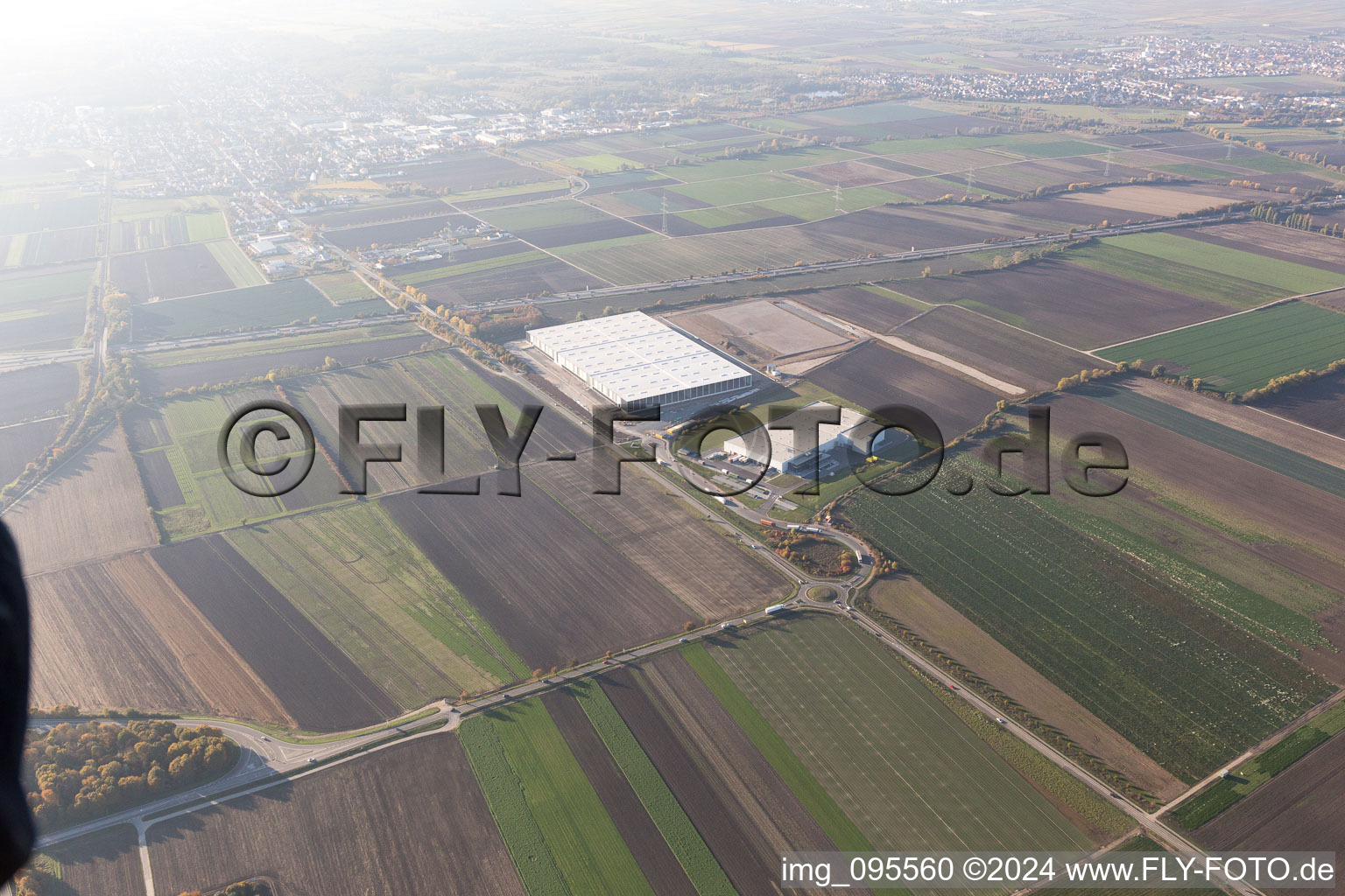 Aerial view of Construction site to build a new building complex on the site of the logistics center of  Inc. in Frankenthal in the state Rhineland-Palatinate