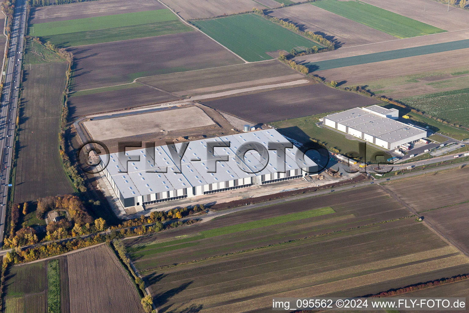 Oblique view of Construction site to build a new building complex on the site of the logistics center of  Inc. in Frankenthal in the state Rhineland-Palatinate