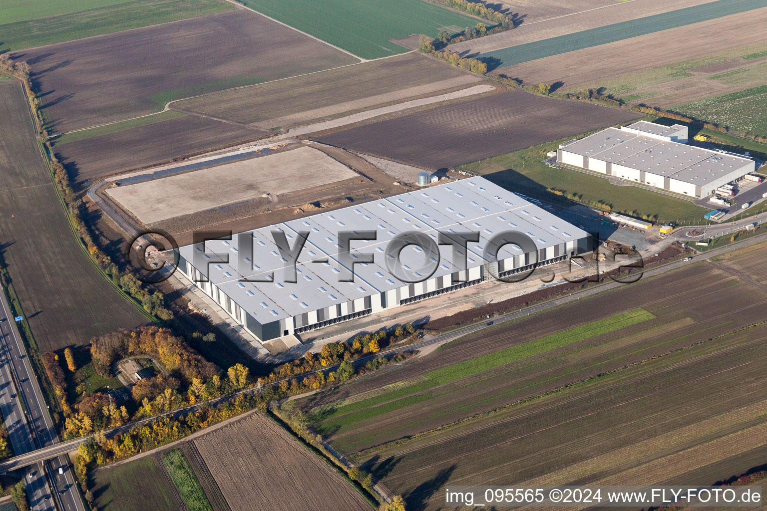 Construction site to build a new building complex on the site of the logistics center of  Inc. in Frankenthal in the state Rhineland-Palatinate from above