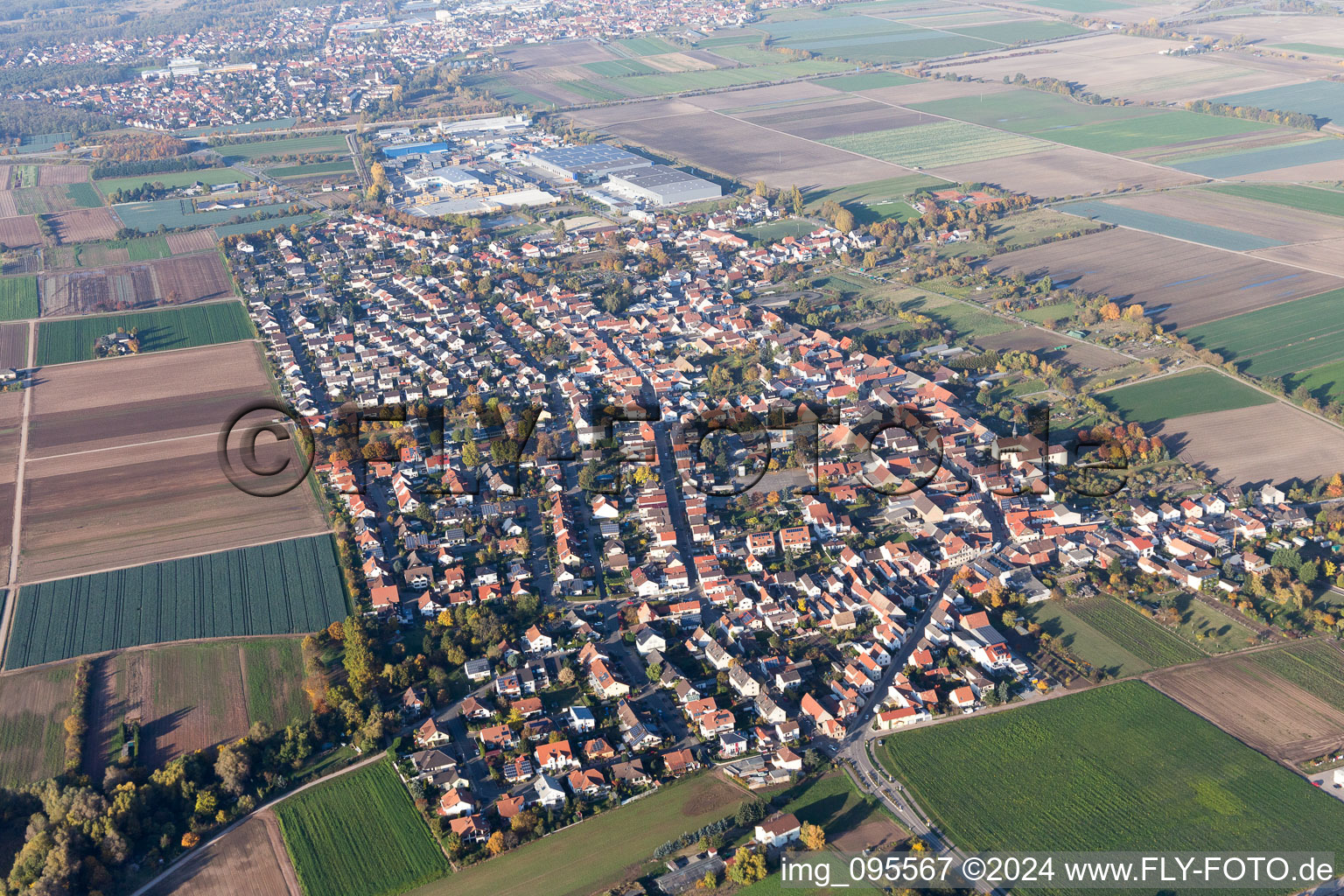 Village - view on the edge of agricultural fields and farmland in Fussgoenheim in the state Rhineland-Palatinate, Germany