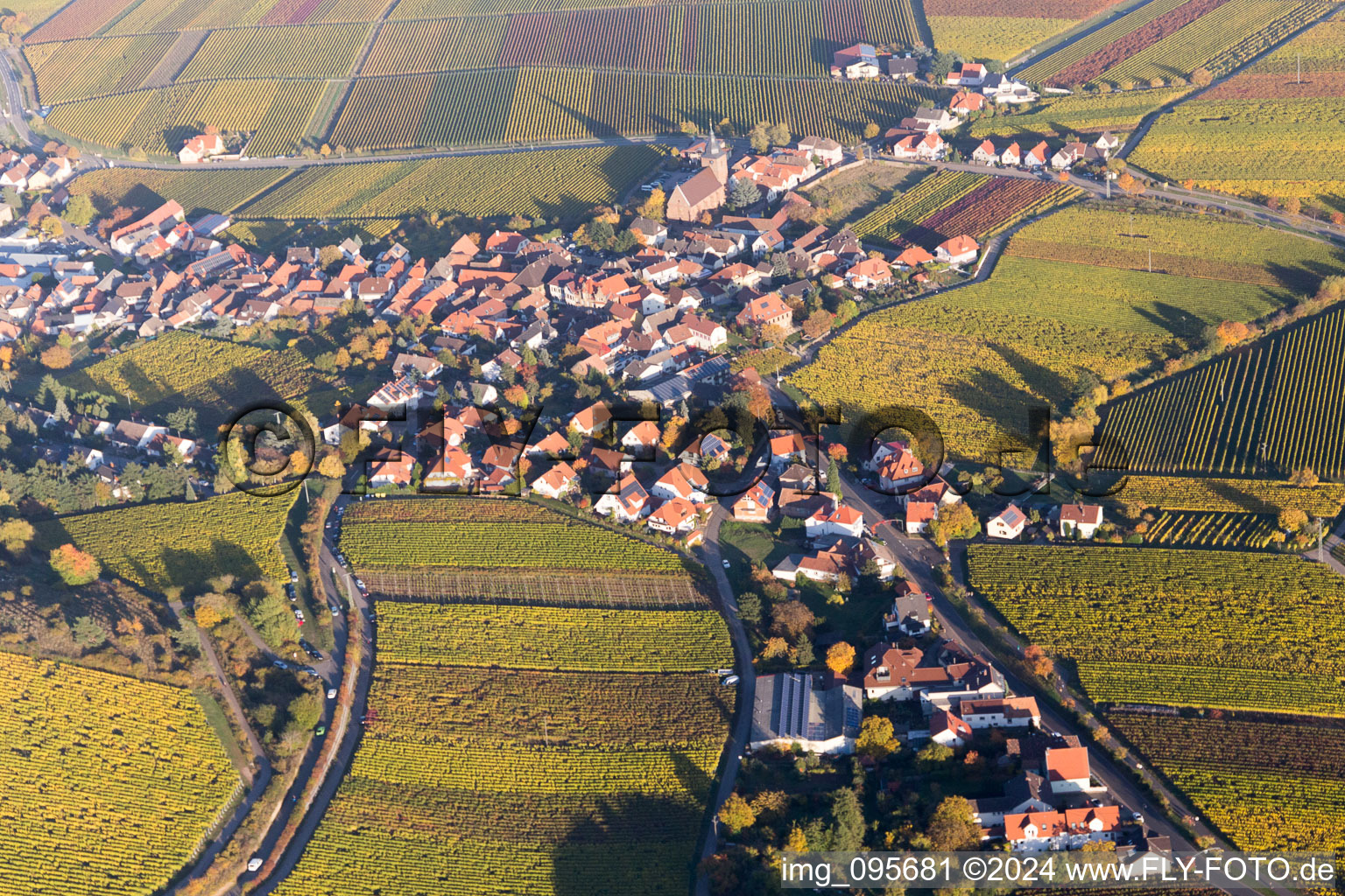 Aerial view of Village - view on the edge of agricultural fields and farmland in Gleisweiler in the state Rhineland-Palatinate, Germany