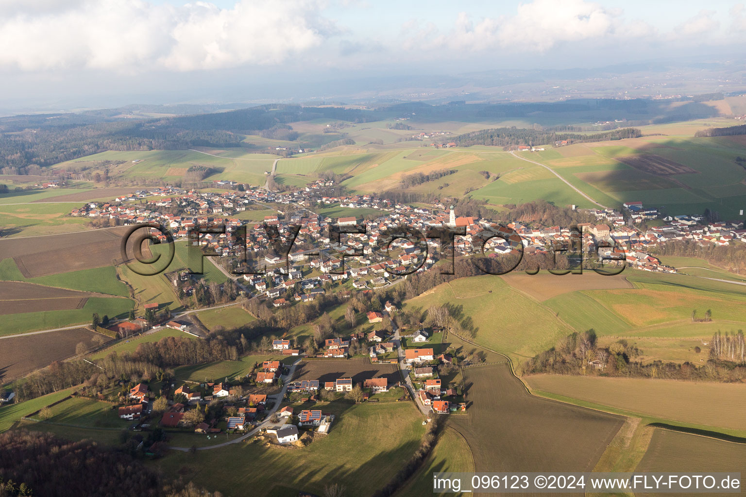 Village - view on the edge of agricultural fields and farmland in Koesslarn in the state Bavaria, Germany