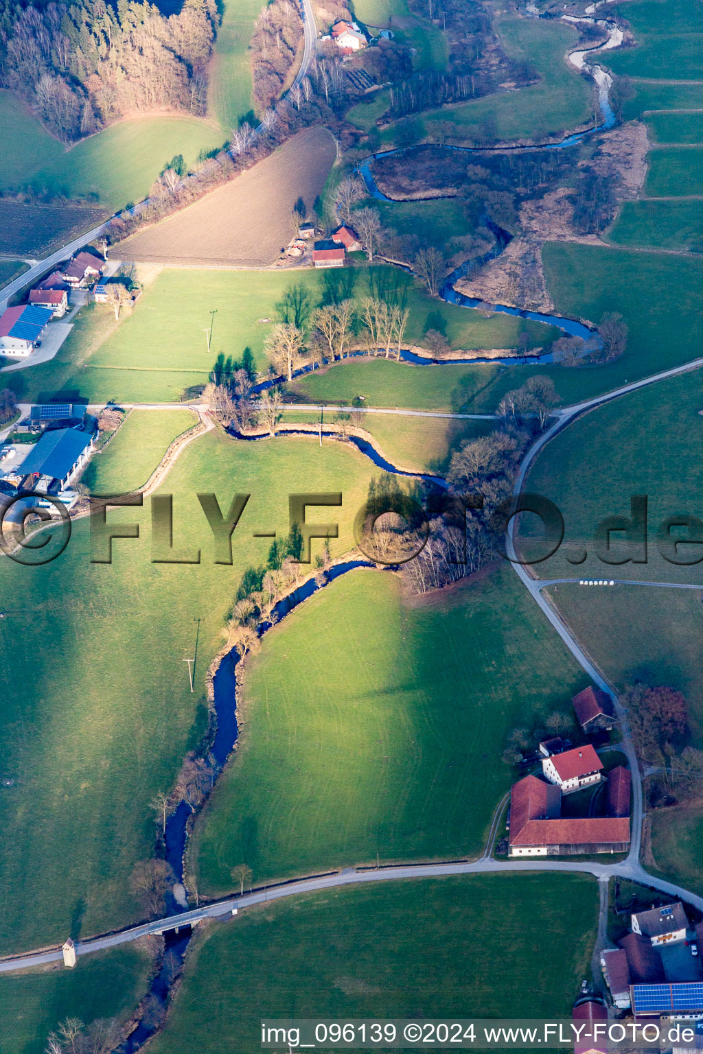 Curved loop of the riparian zones on the course of the river Haselbach in Triftern in the state Bavaria, Germany