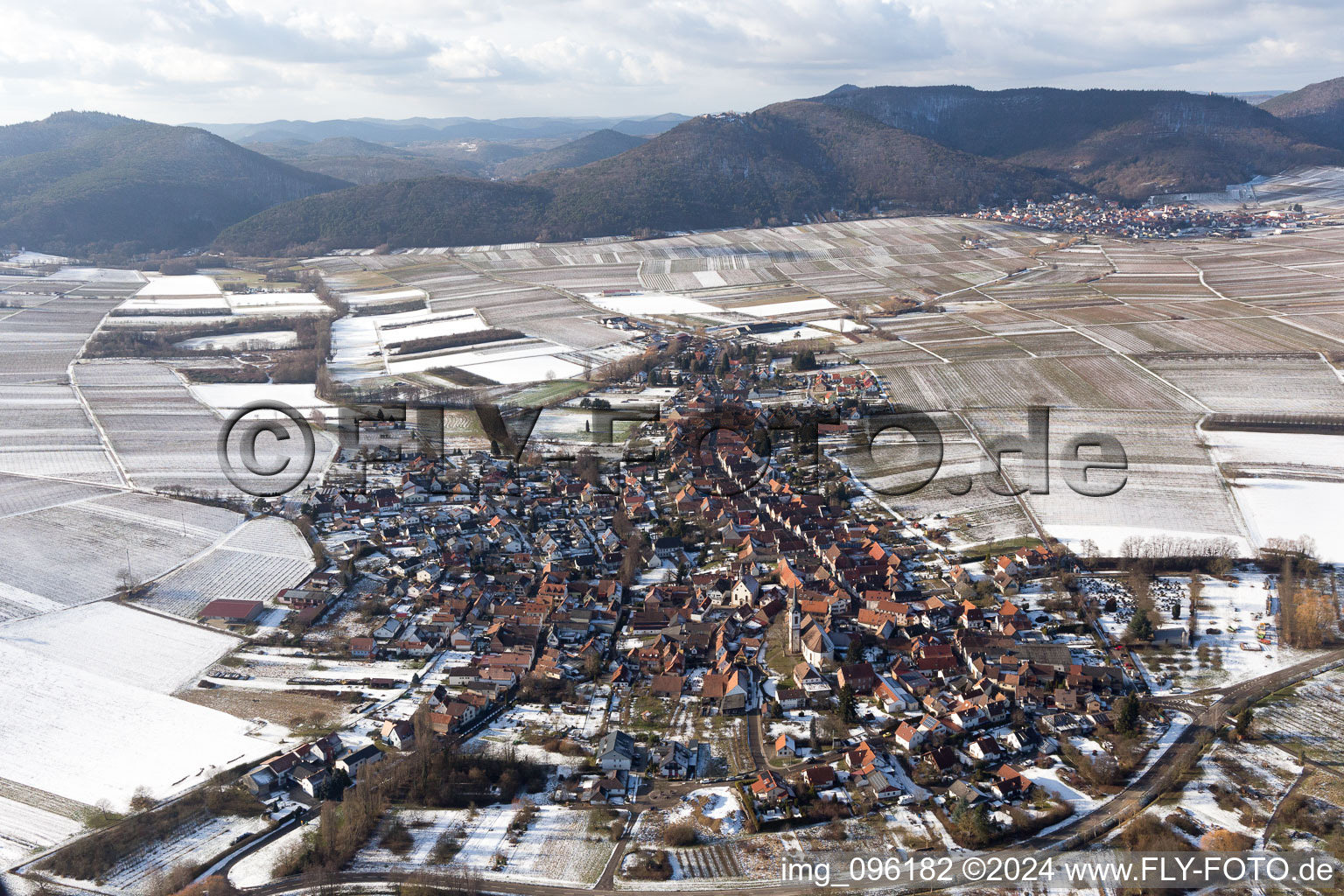 Winter snow covered village view in Göcklingen in the state Rhineland-Palatinate, Germany