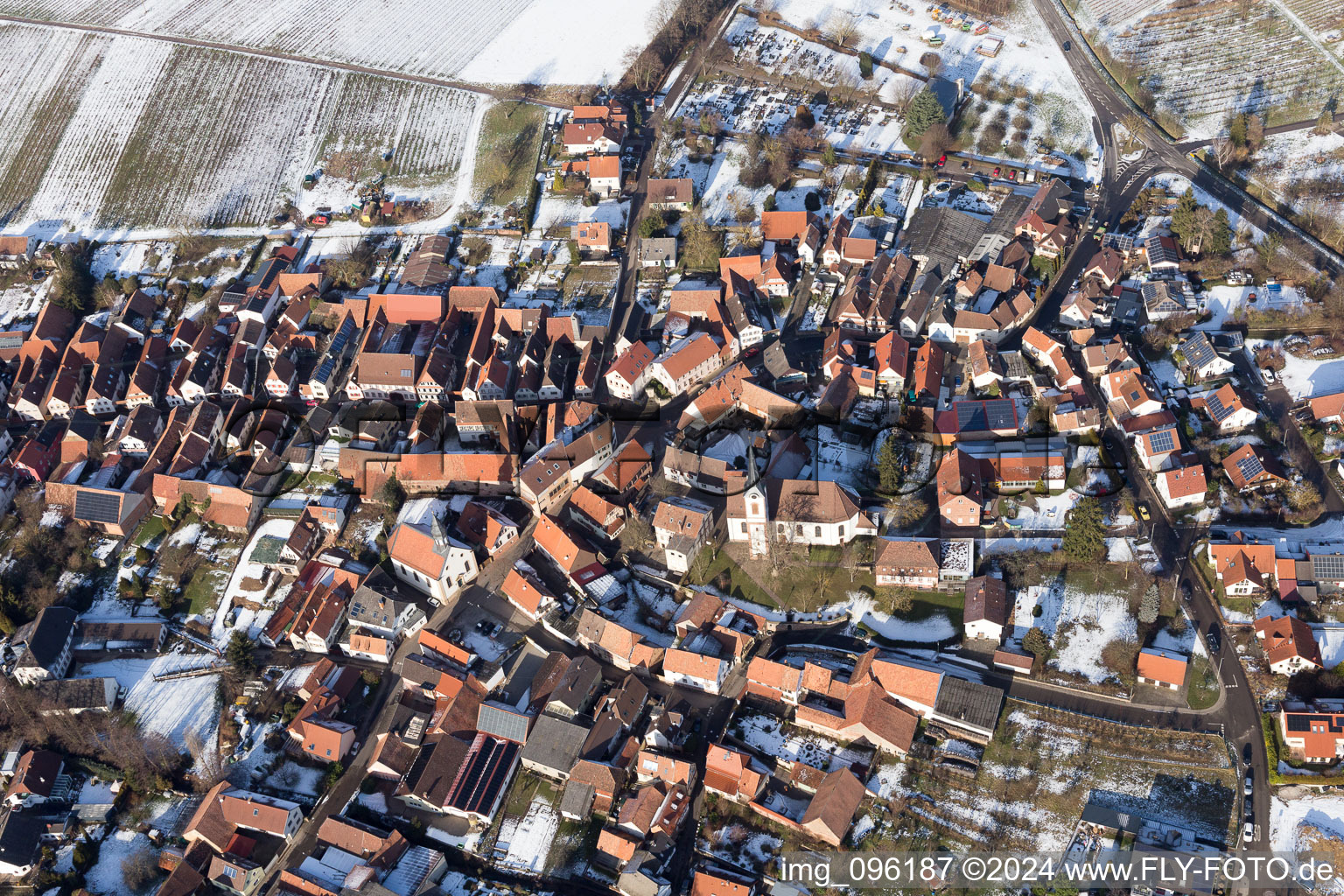 Aerial photograpy of Wintry snowy Village view in Goecklingen in the state Rhineland-Palatinate, Germany