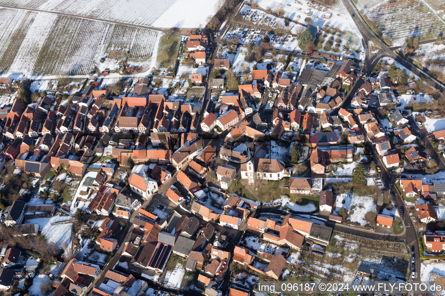 Aerial photograpy of Winter snow covered village view in Göcklingen in the state Rhineland-Palatinate, Germany