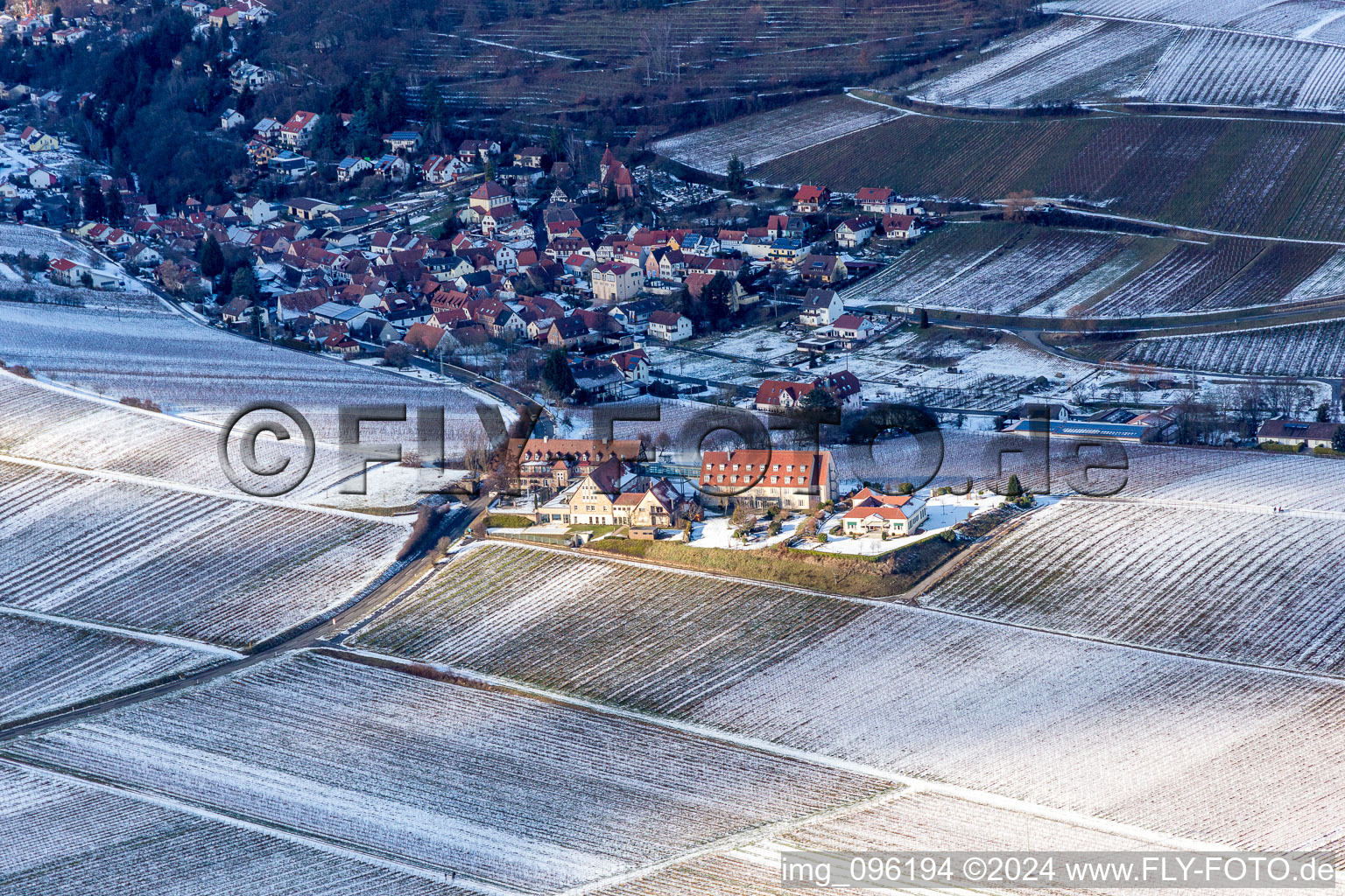 Wintry snowy Complex of the hotel building Leinsweiler Hof in Leinsweiler in the state Rhineland-Palatinate, Germany