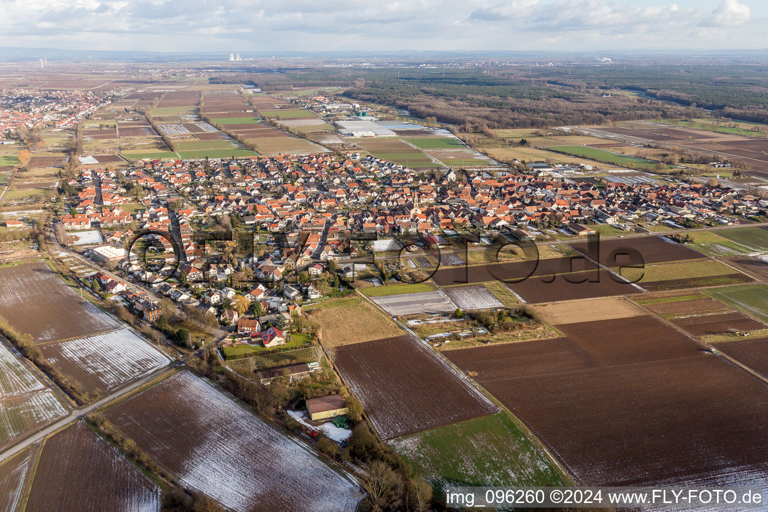 Village - view on the edge of agricultural fields and farmland in Zeiskam in the state Rhineland-Palatinate, Germany