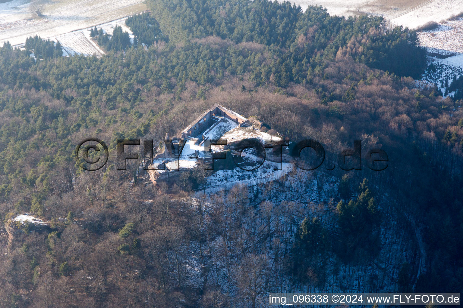 Wintry snowy Ruins and vestiges of the former castle and fortress Lindelbrunn in Vorderweidenthal in the state Rhineland-Palatinate