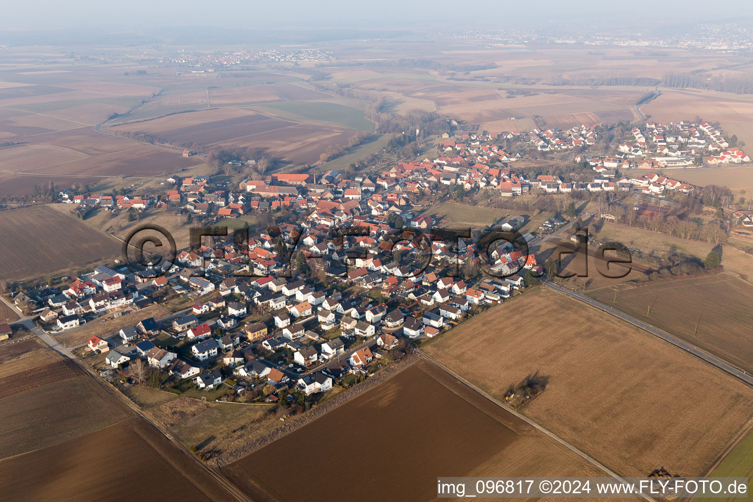 Aerial view of Village - view on the edge of agricultural fields and farmland in the district Habitzheim in Otzberg in the state Hesse, Germany