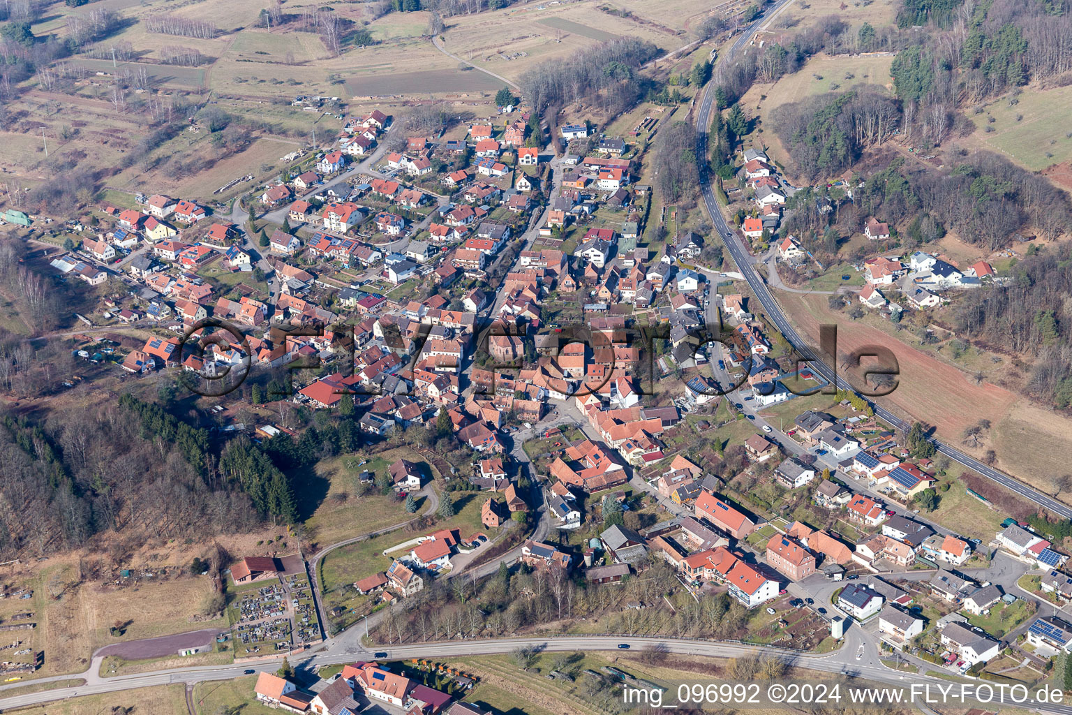 Aerial view of Village - view on the edge of agricultural fields and farmland in Voelkersweiler in the state Rhineland-Palatinate, Germany