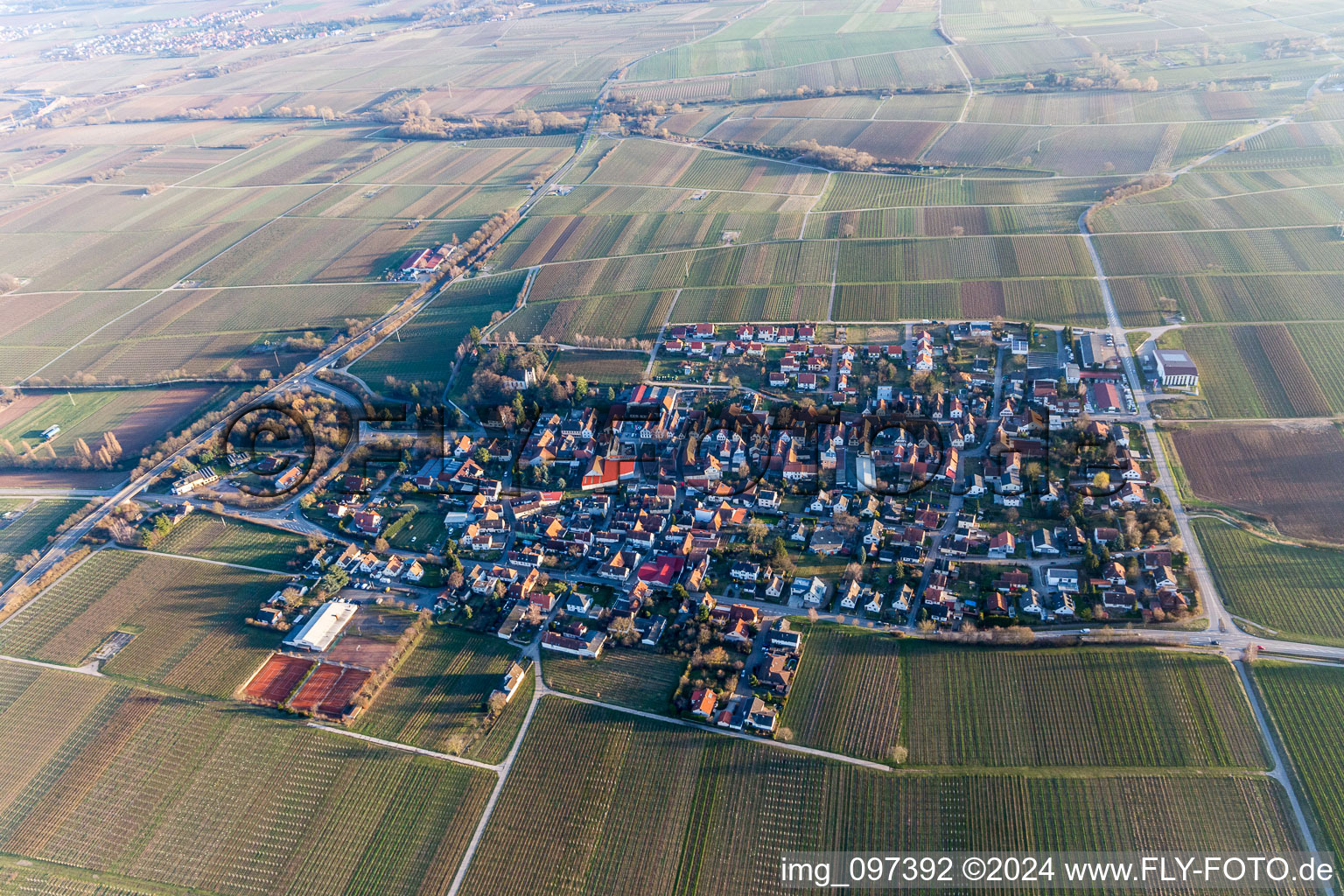 Village - view on the edge of agricultural fields and farmland in Walsheim in the state Rhineland-Palatinate, Germany