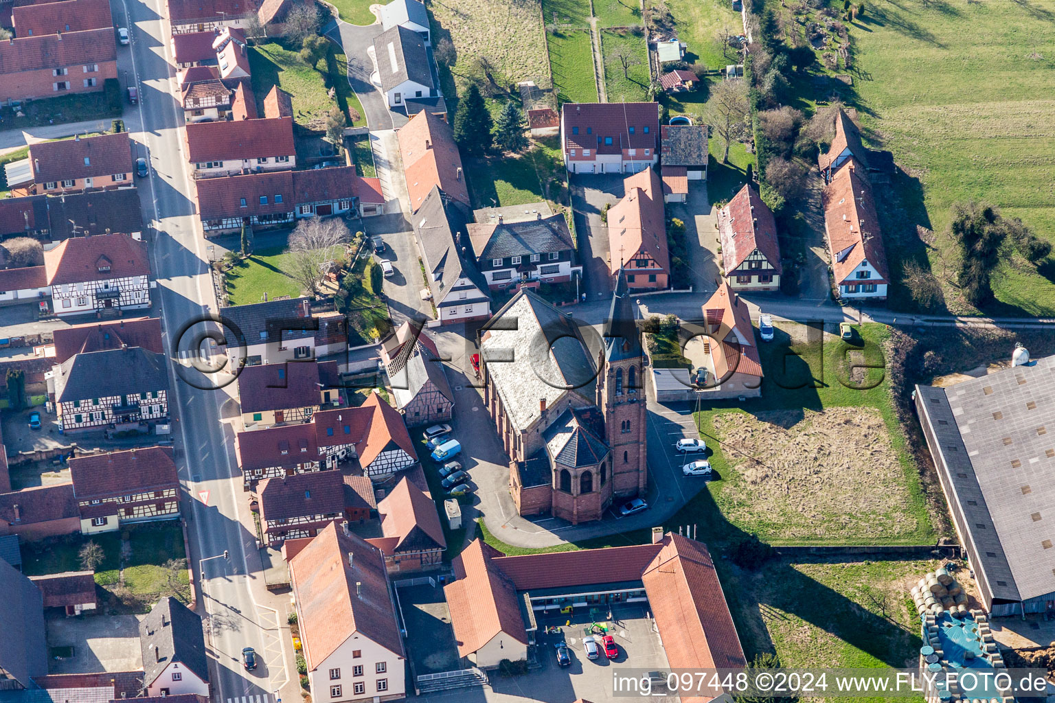 Aerial view of Church building in the village of in Betschdorf in Grand Est, France