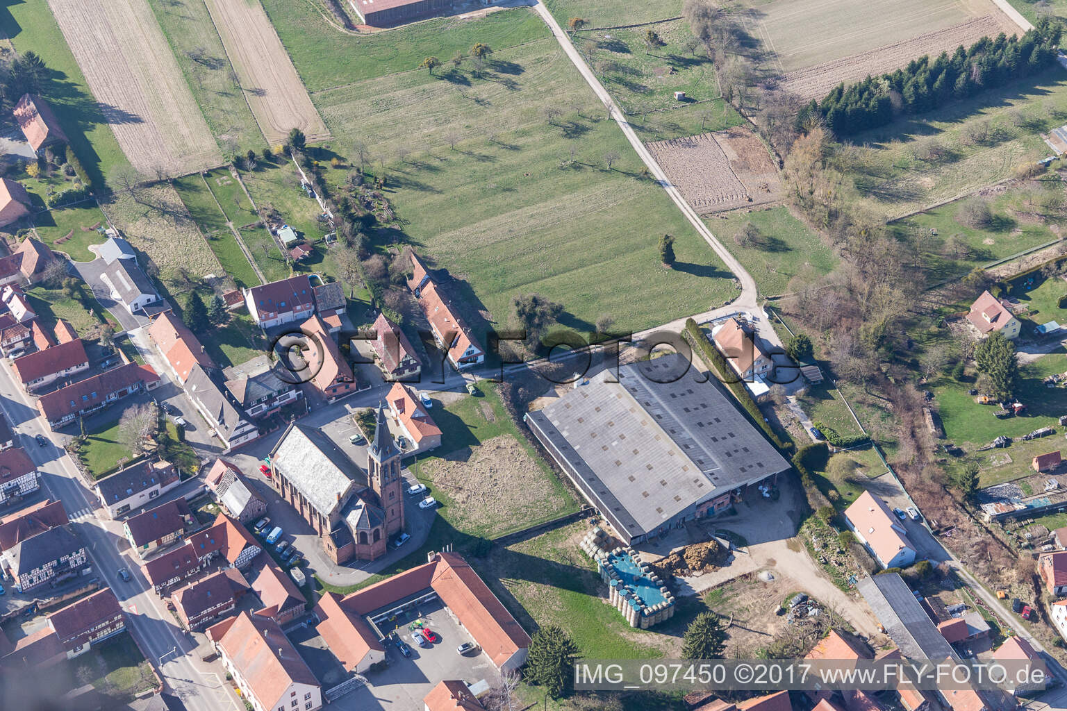 Aerial photograpy of Church building in the village of in Betschdorf in Grand Est, France