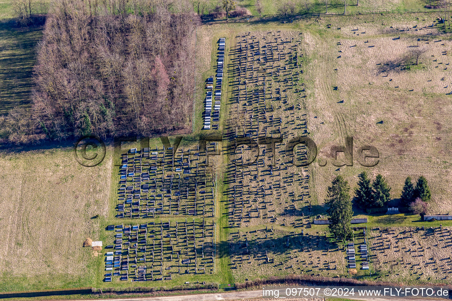 Oblique view of Grave rows on the grounds of the cemetery in Ettendorf in Grand Est, France