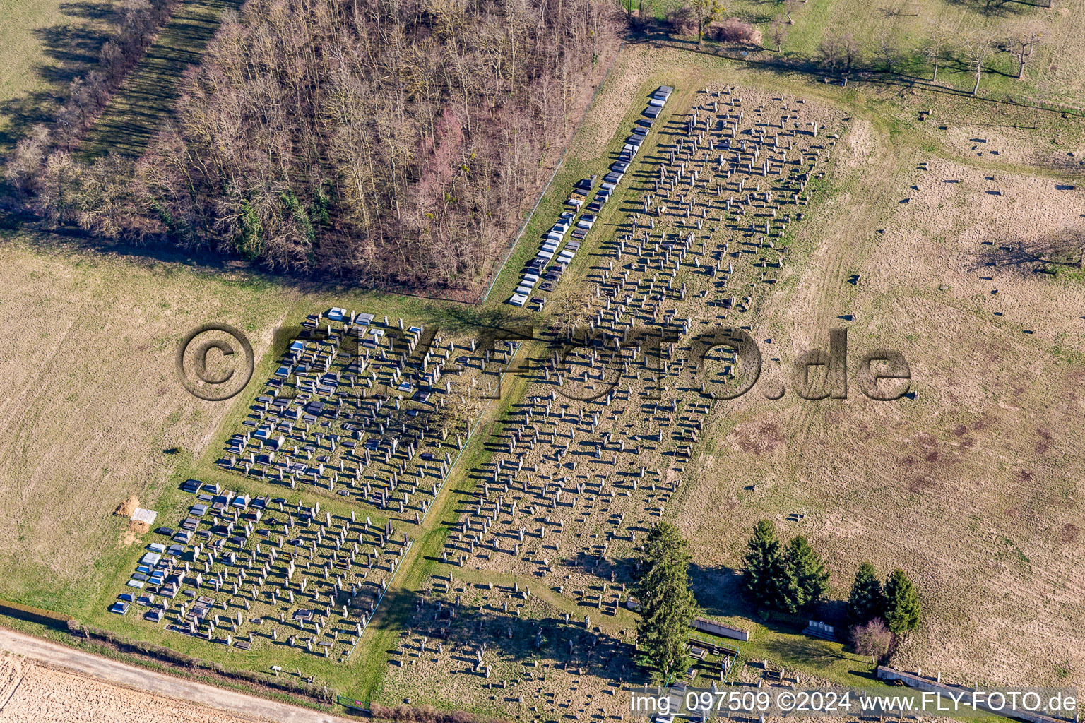 Grave rows on the grounds of the cemetery in Ettendorf in Grand Est, France out of the air