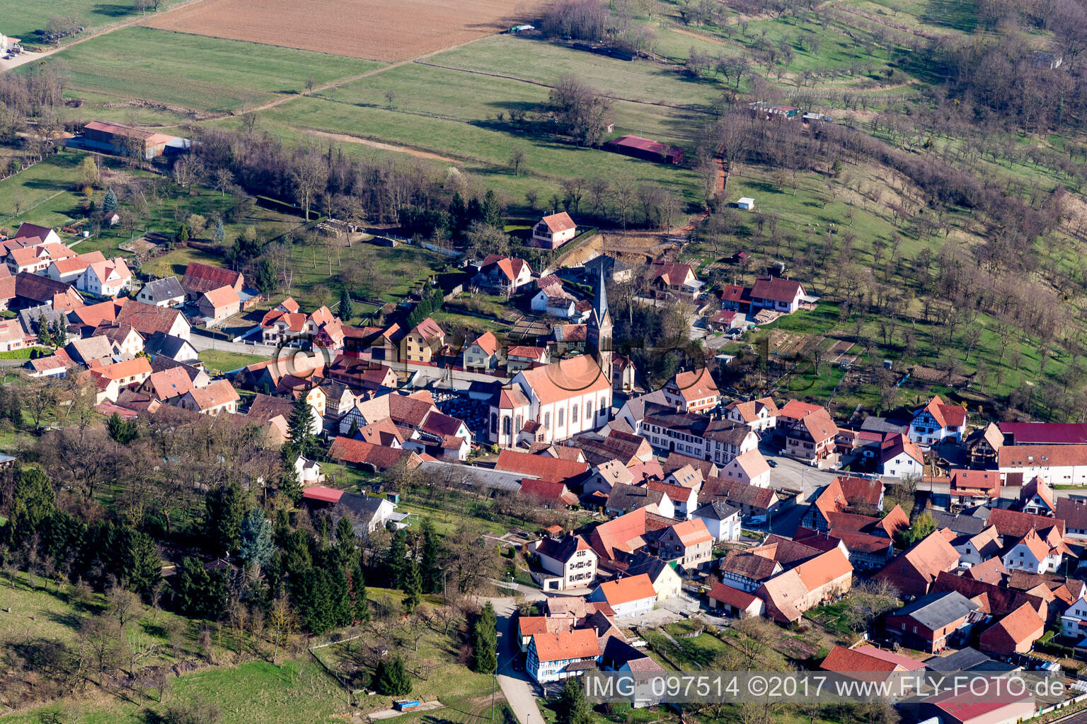 Aerial view of Church building in the village of in Ettendorf in Grand Est, France