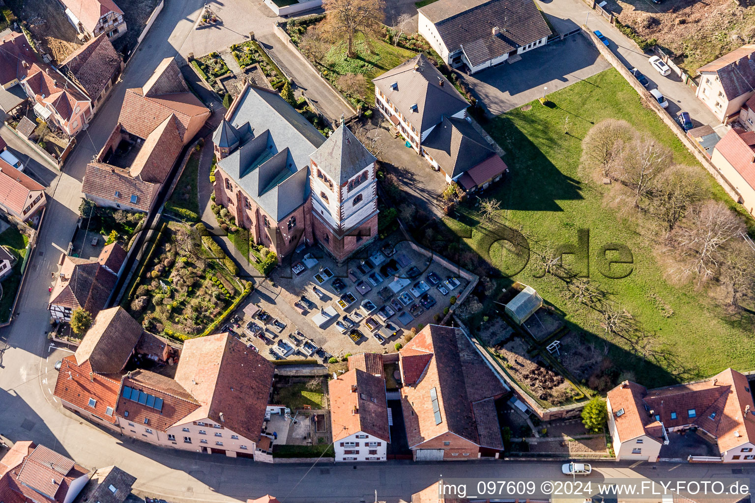 Aerial view of Protestantic Church building in the village of in Schwindratzheim in Grand Est, France