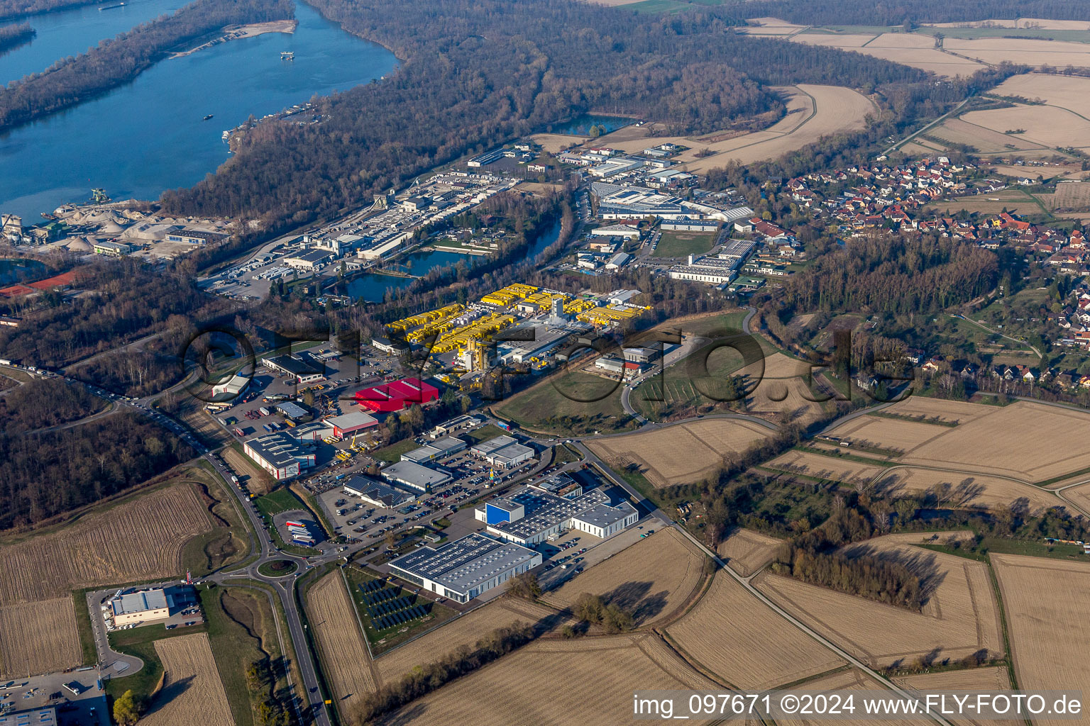 Oblique view of Building and production halls on the premises of Xella Deutschland GmbH in the district Freistett in Rheinau in the state Baden-Wurttemberg, Germany