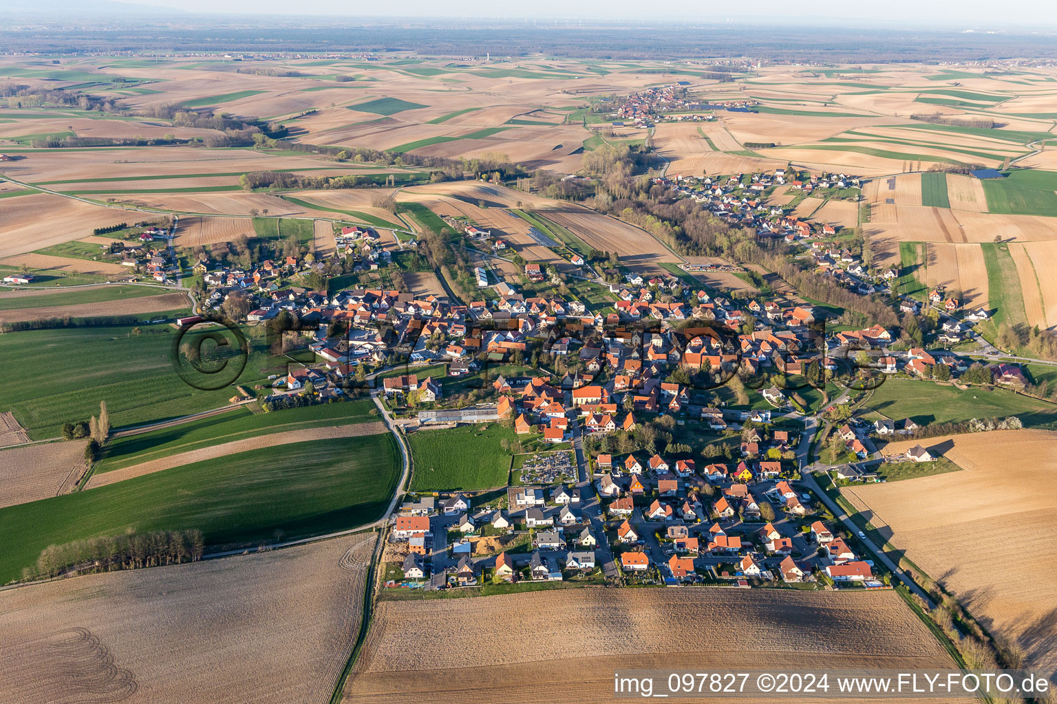 Village - view on the edge of agricultural fields and farmland in Trimbach in Grand Est, France