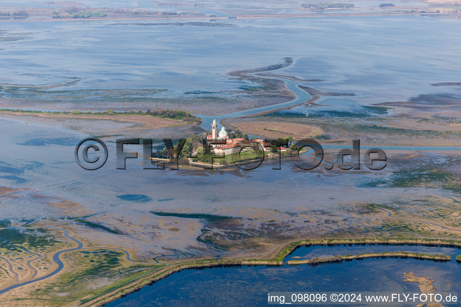 Aerial view of Coastal area of the Adria - Island and monastery of Santuario Di Barbana in Grado in Friuli-Venezia Giulia, Italy