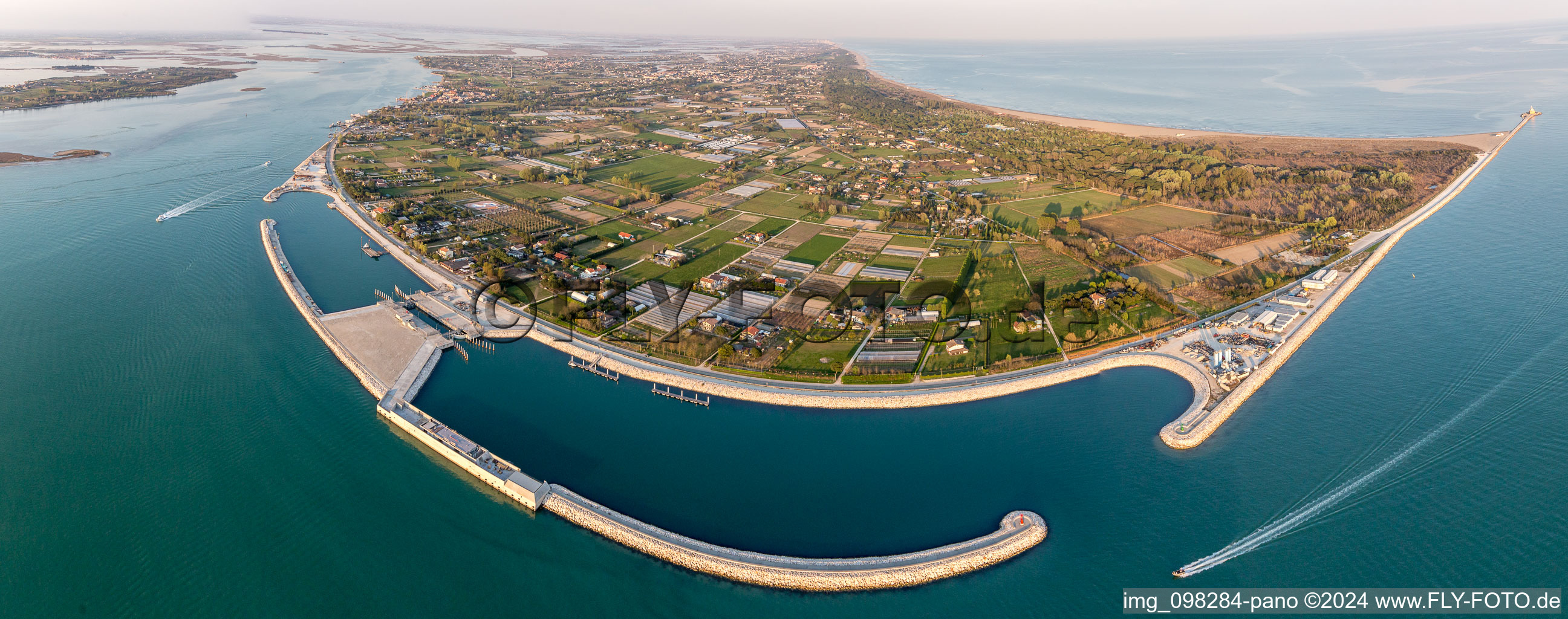 Aerial view of Artificial Island for high-water protection of the lido di Venezia "Isola Artificiale del Baccan di Sant'Erasmo" near Punta Sabbioni in Venetien, Italy