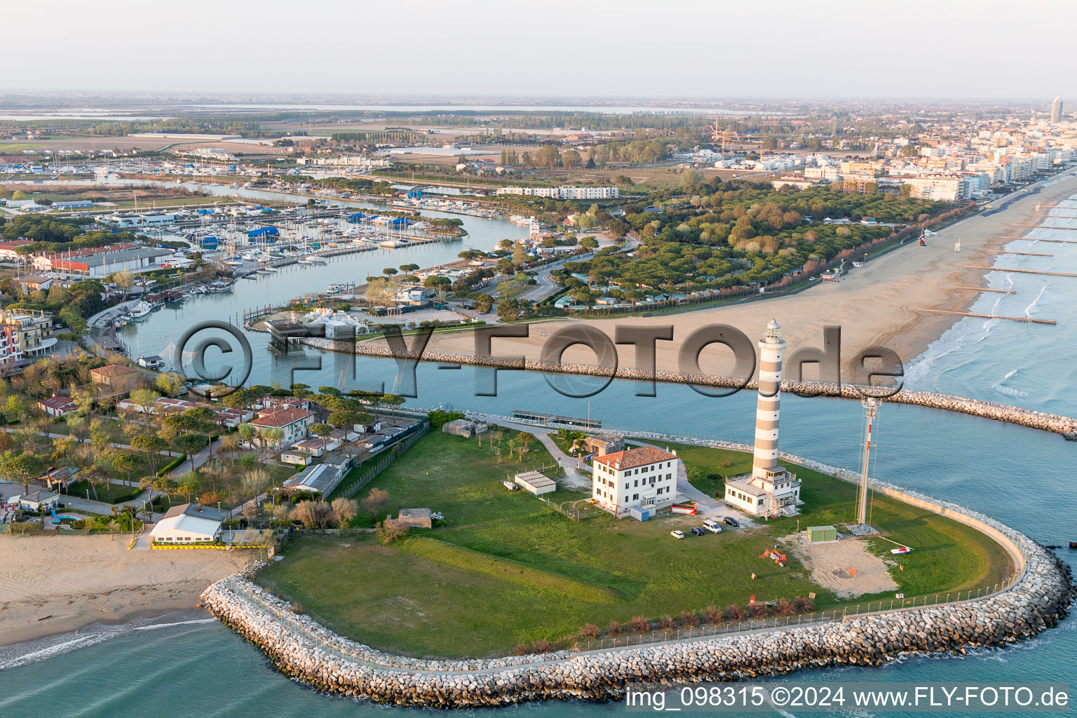 Light House Faro di Piave Vecchiaas a historic seafaring character in the coastal area of Adria in Lido di Jesolo in Venetien, Italy seen from above