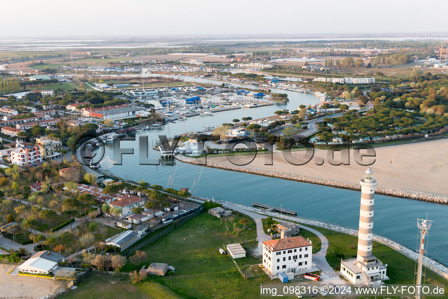 Light House Faro di Piave Vecchiaas a historic seafaring character in the coastal area of Adria in Lido di Jesolo in Venetien, Italy out of the air