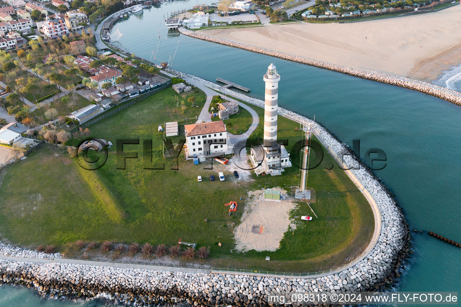 Light House Faro di Piave Vecchiaas a historic seafaring character in the coastal area of Adria in Lido di Jesolo in Venetien, Italy seen from above