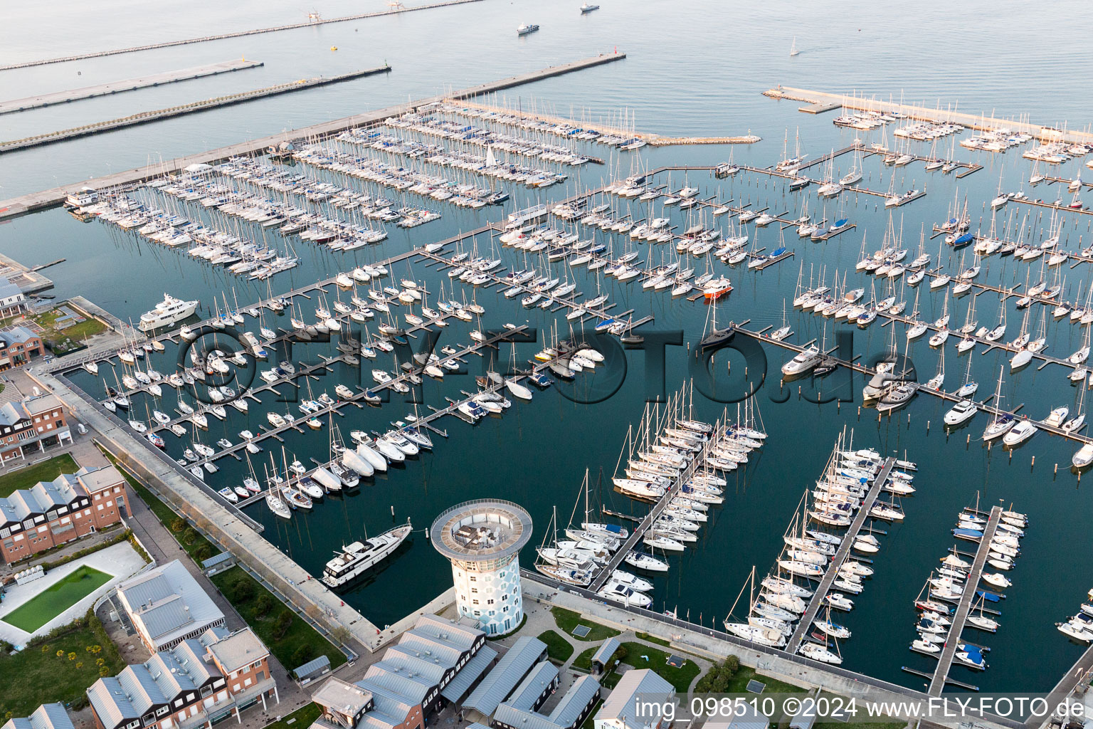 Pleasure boat marina with docks and moorings on the shore area Porto Turistico 'Marinara' in Marina di Ravenna in Emilia-Romagna, Italy