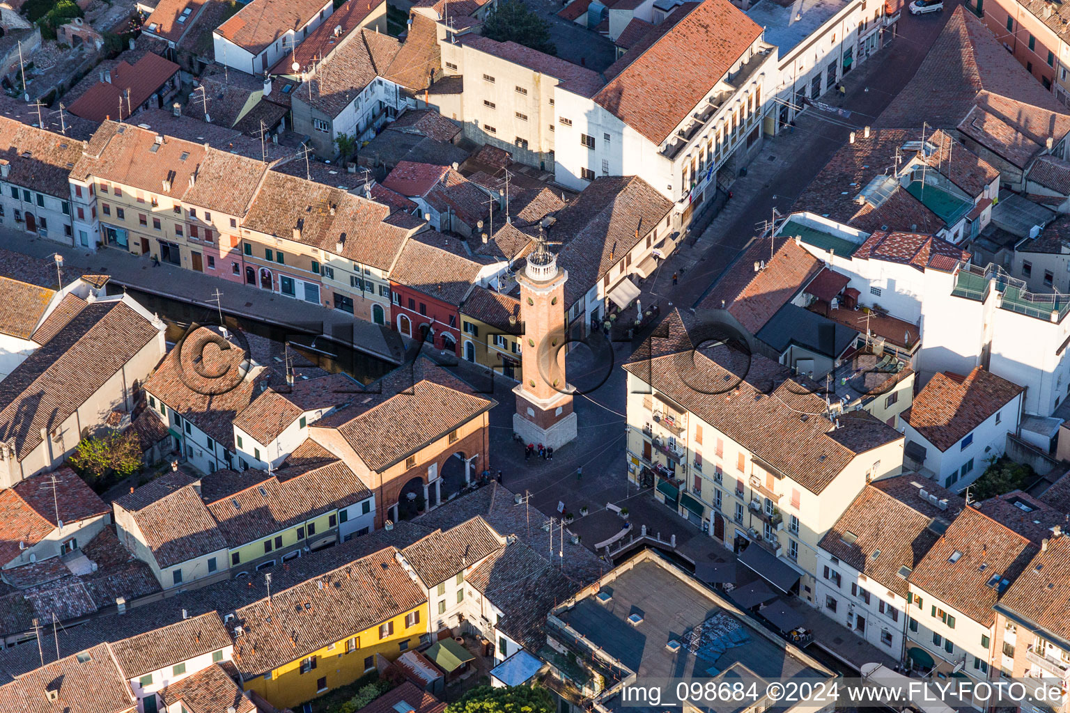 Tower building Torre Civica between ancient roads in the historic city centre of Comacchio in Emilia-Romagna, Italy