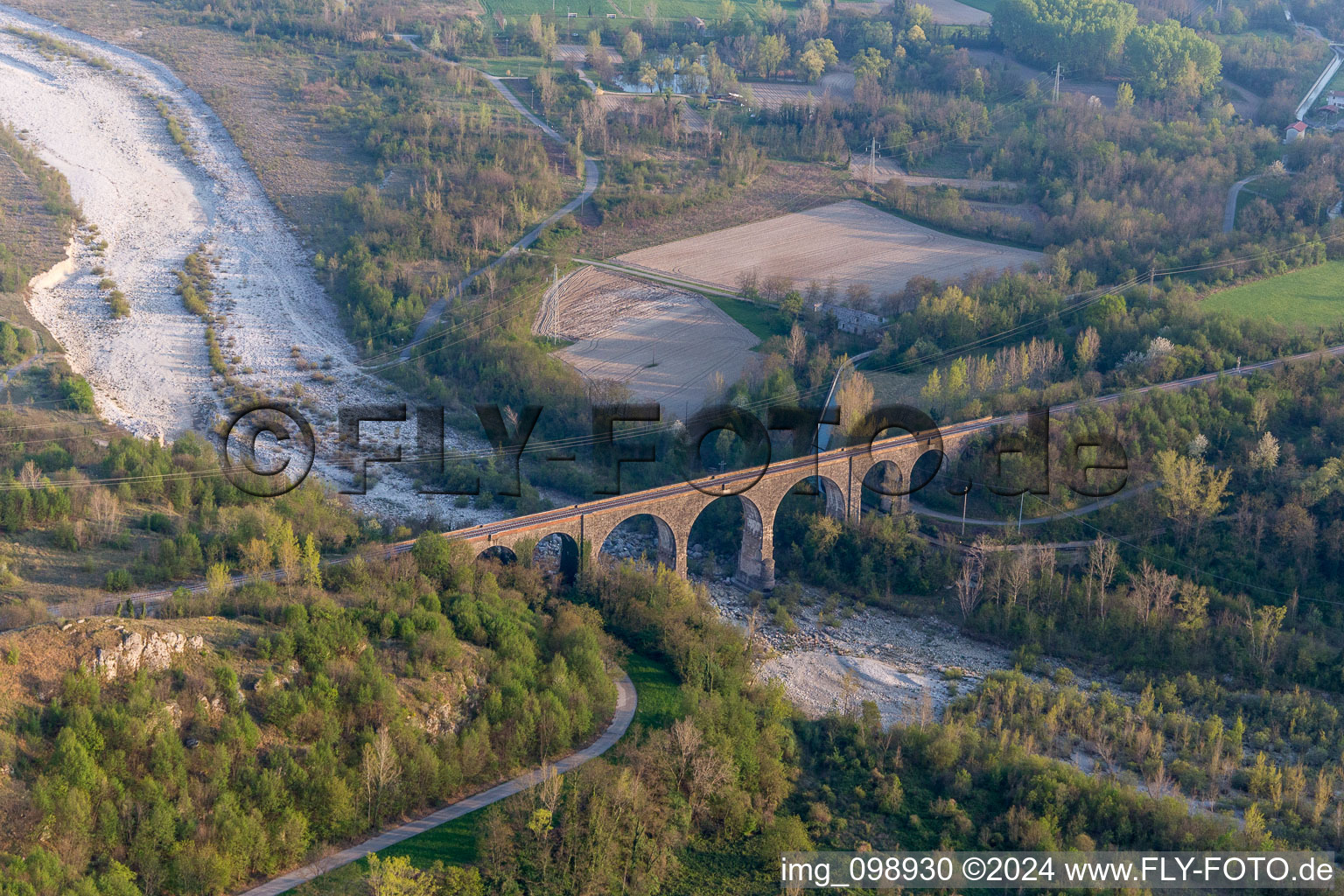 Oblique view of Viaduct of the railway bridge structure to route the railway tracks ver the tagliamento in Cavasso Nuovo in Friuli-Venezia Giulia, Italy