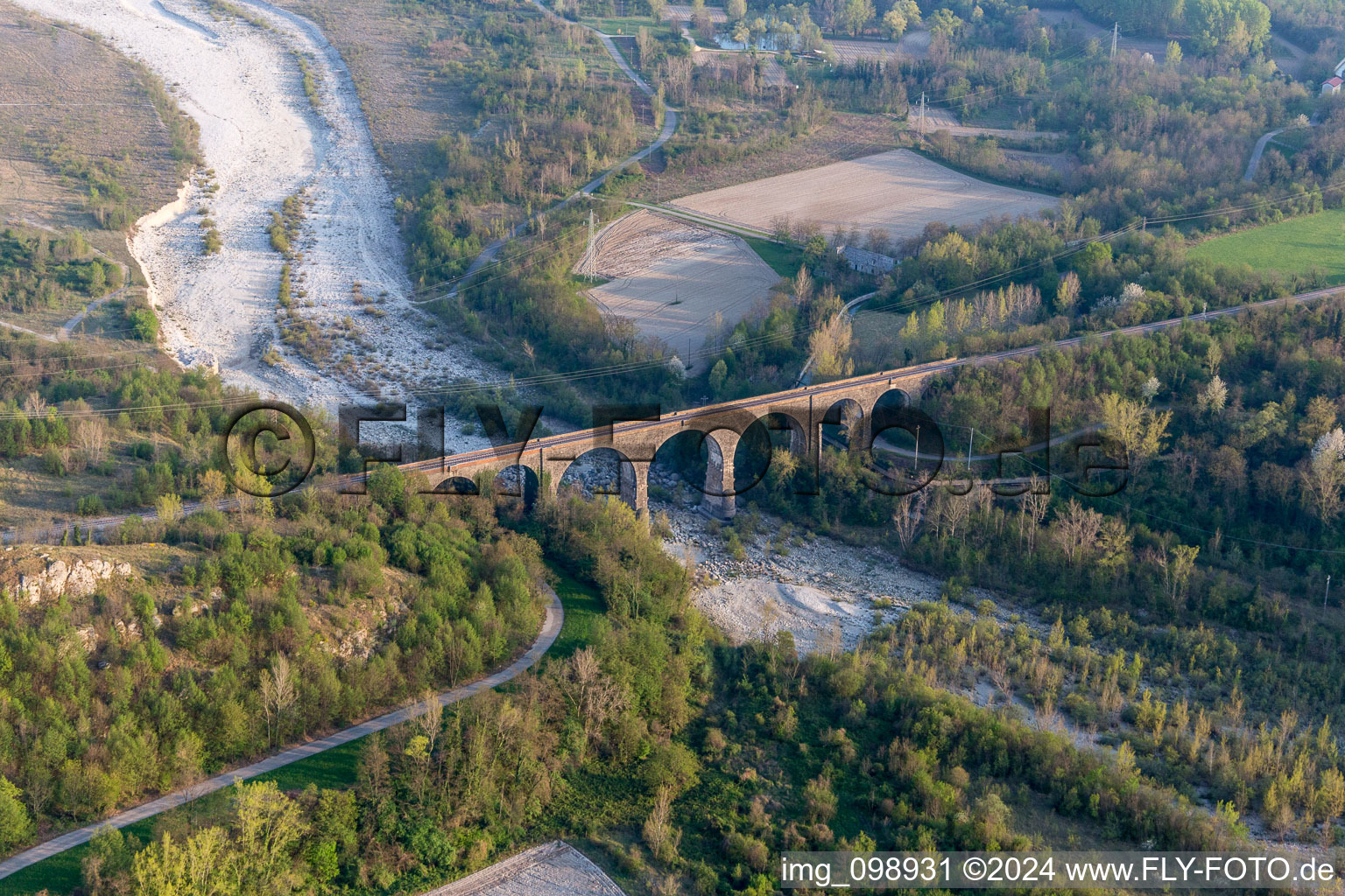 Viaduct of the railway bridge structure to route the railway tracks ver the tagliamento in Cavasso Nuovo in Friuli-Venezia Giulia, Italy from above