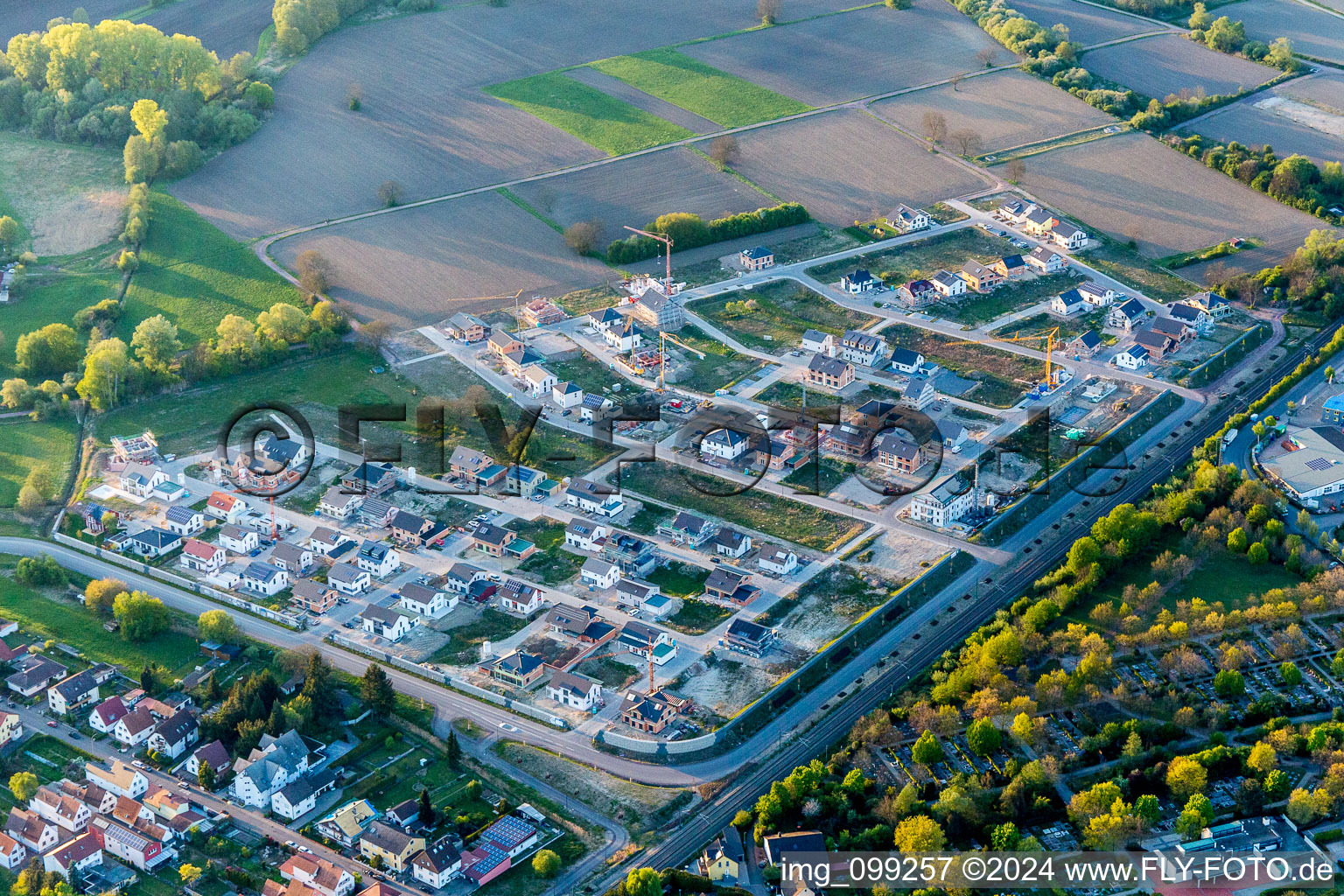 Aerial view of Construction sites for new construction residential area of detached housing estate In den Niederwiesen in Woerth am Rhein in the state Rhineland-Palatinate, Germany