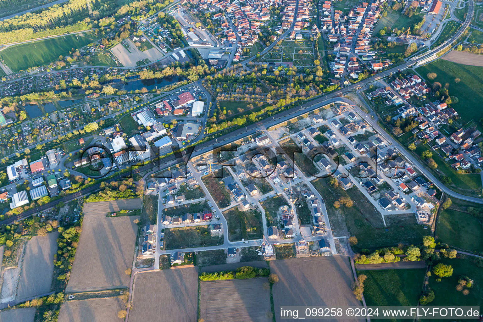 Aerial photograpy of Construction sites for new construction residential area of detached housing estate In den Niederwiesen in Woerth am Rhein in the state Rhineland-Palatinate, Germany