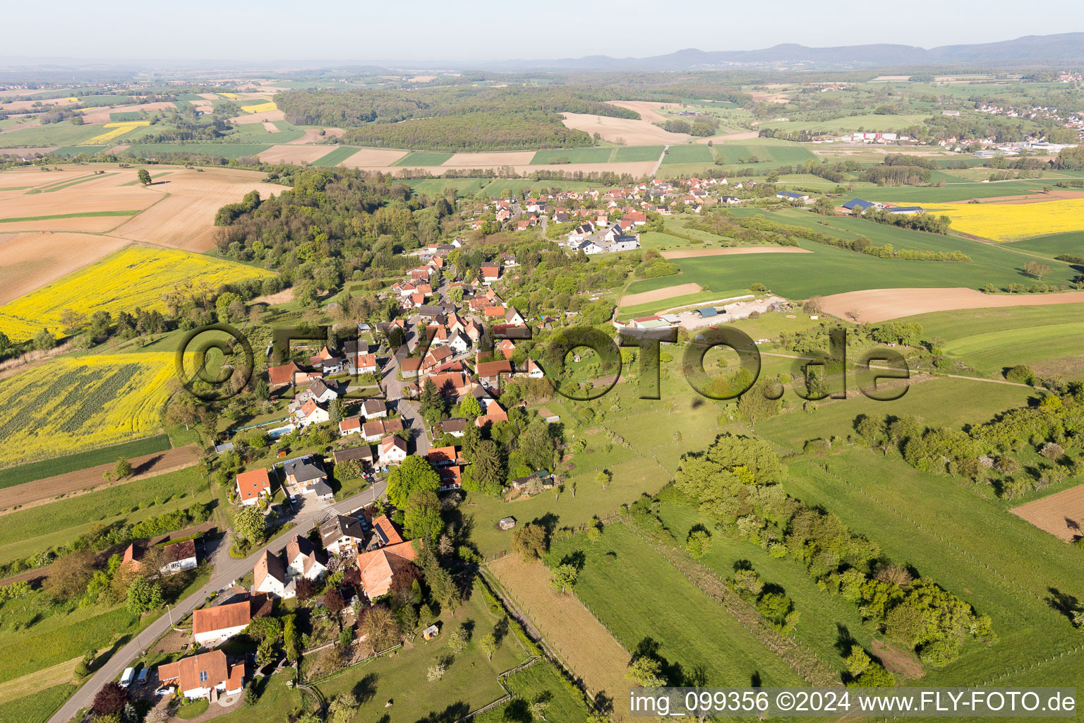 Village - view on the edge of agricultural fields and farmland in Gunstett in Grand Est, France