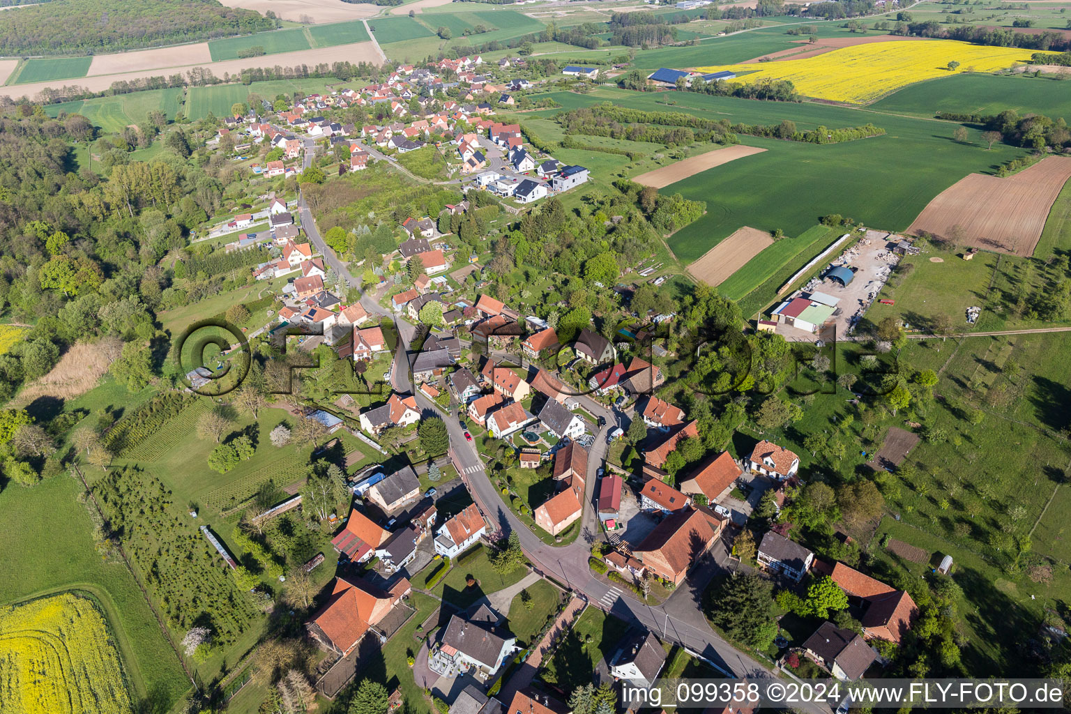 Village - view on the edge of agricultural fields and farmland in Gunstett in Grand Est, France