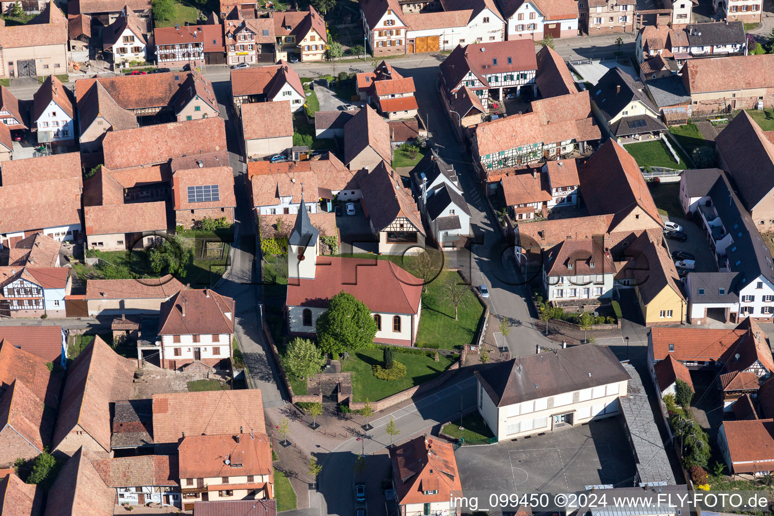 Aerial view of Church building in the village of in Uhrwiller in Grand Est, France