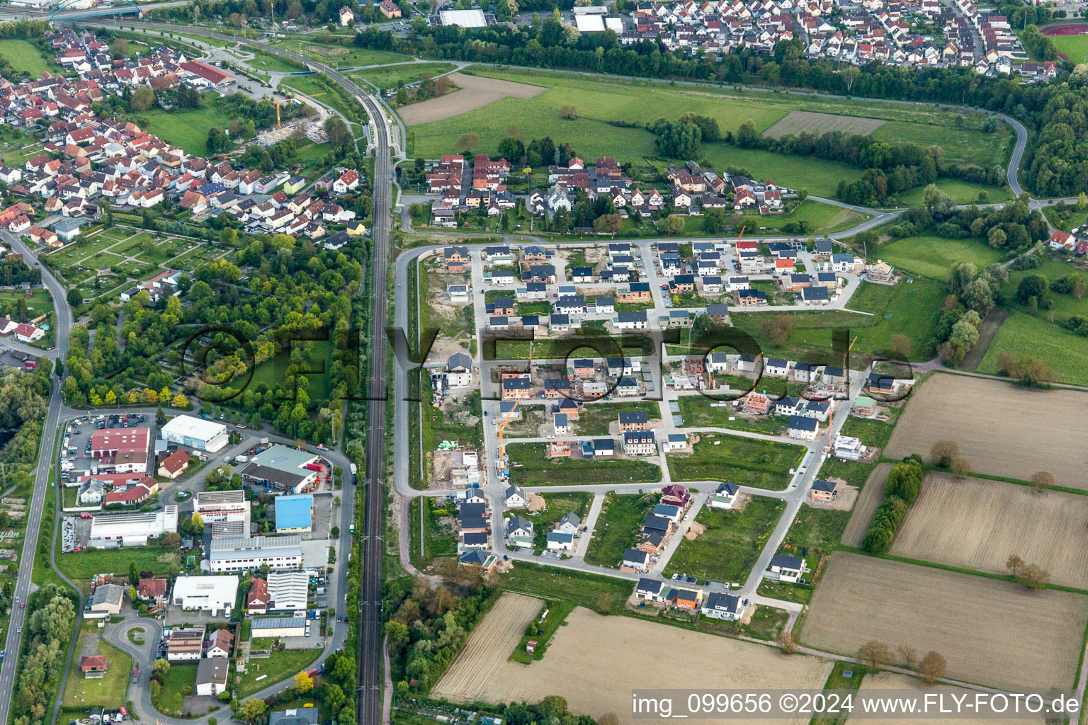 Oblique view of Construction sites for new construction residential area of detached housing estate In den Niederwiesen in Woerth am Rhein in the state Rhineland-Palatinate, Germany