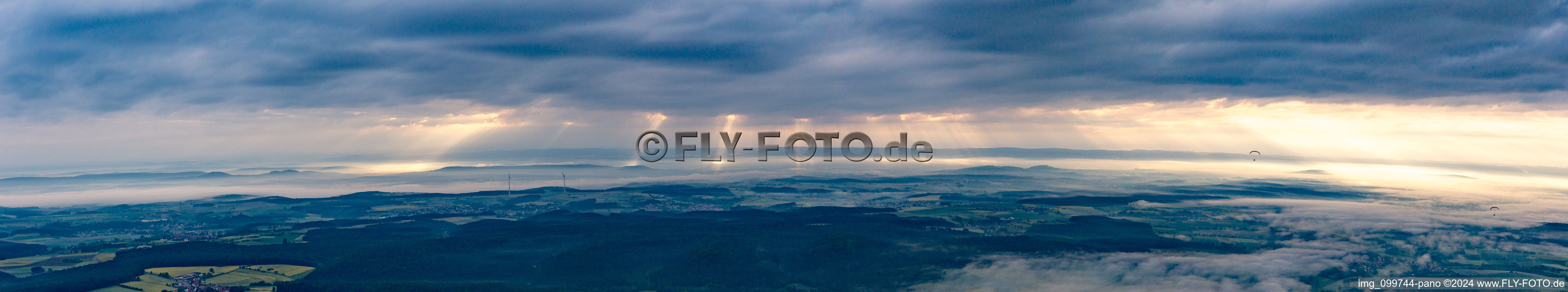 Panorama with two cloud layers in the morning in the district Grub in Schönbrunn im Steigerwald in the state Bavaria, Germany